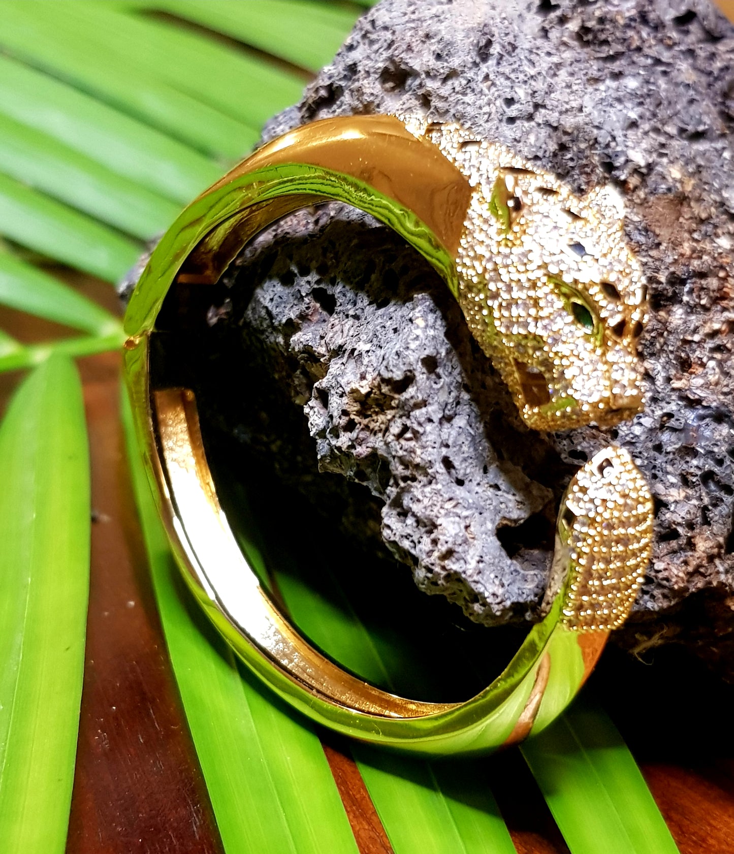 Lion head gold finish bracelet, black stones and CZ detailing