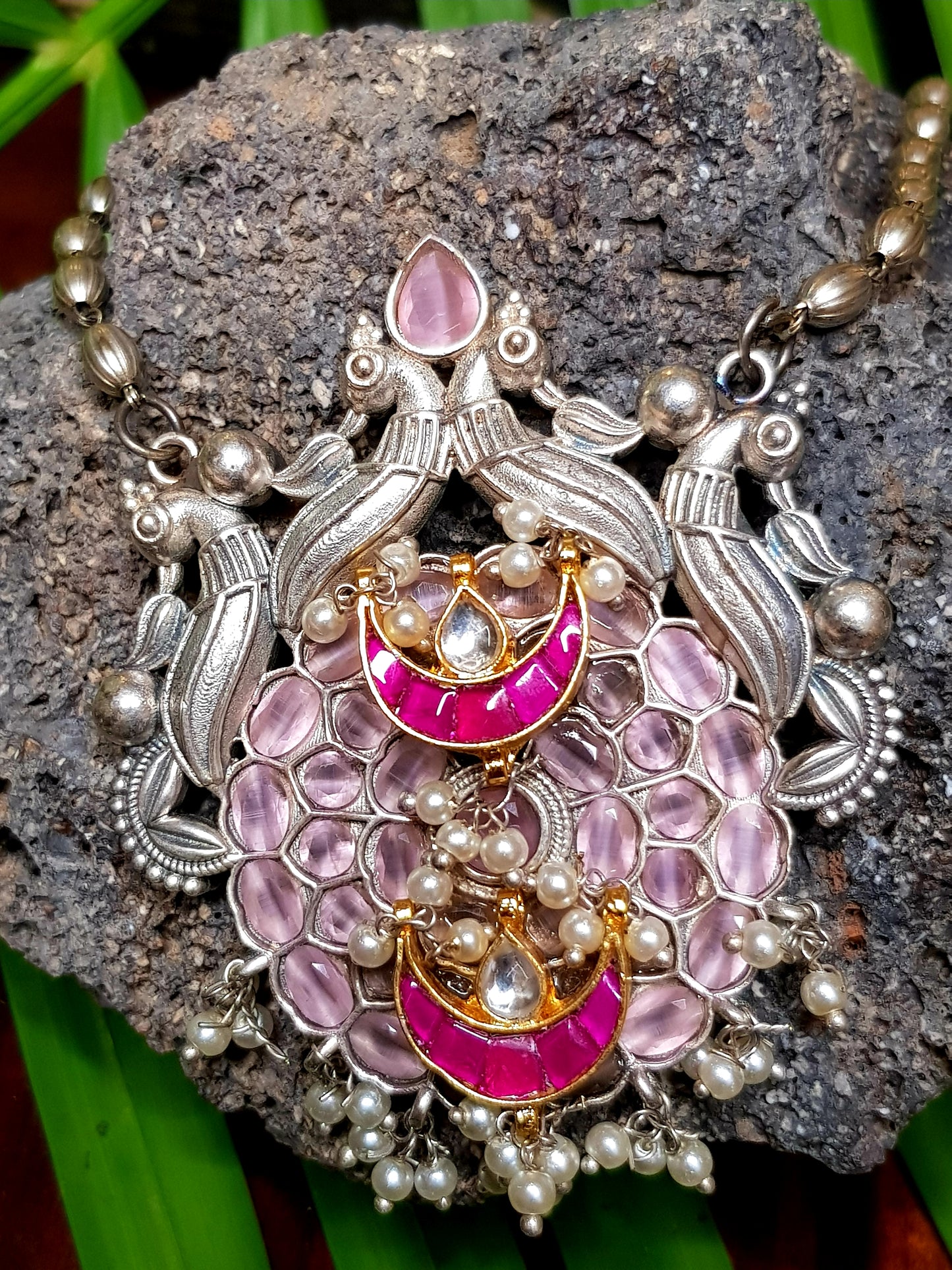 Artistic silver finish set with pendant in light pink and red stones on silver bead string,small jhumkis on studs(earrings)