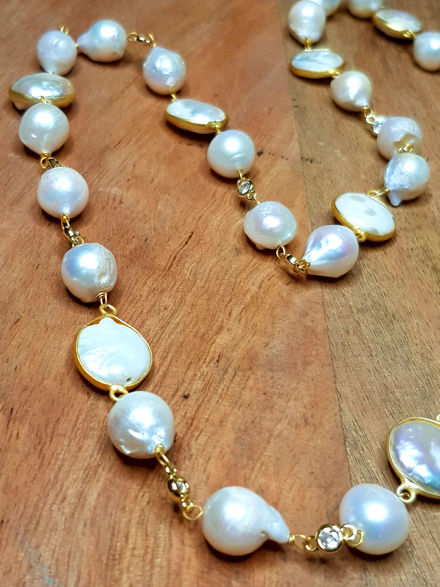 Elegant Baroque Pearl long necklace set in a gold chain