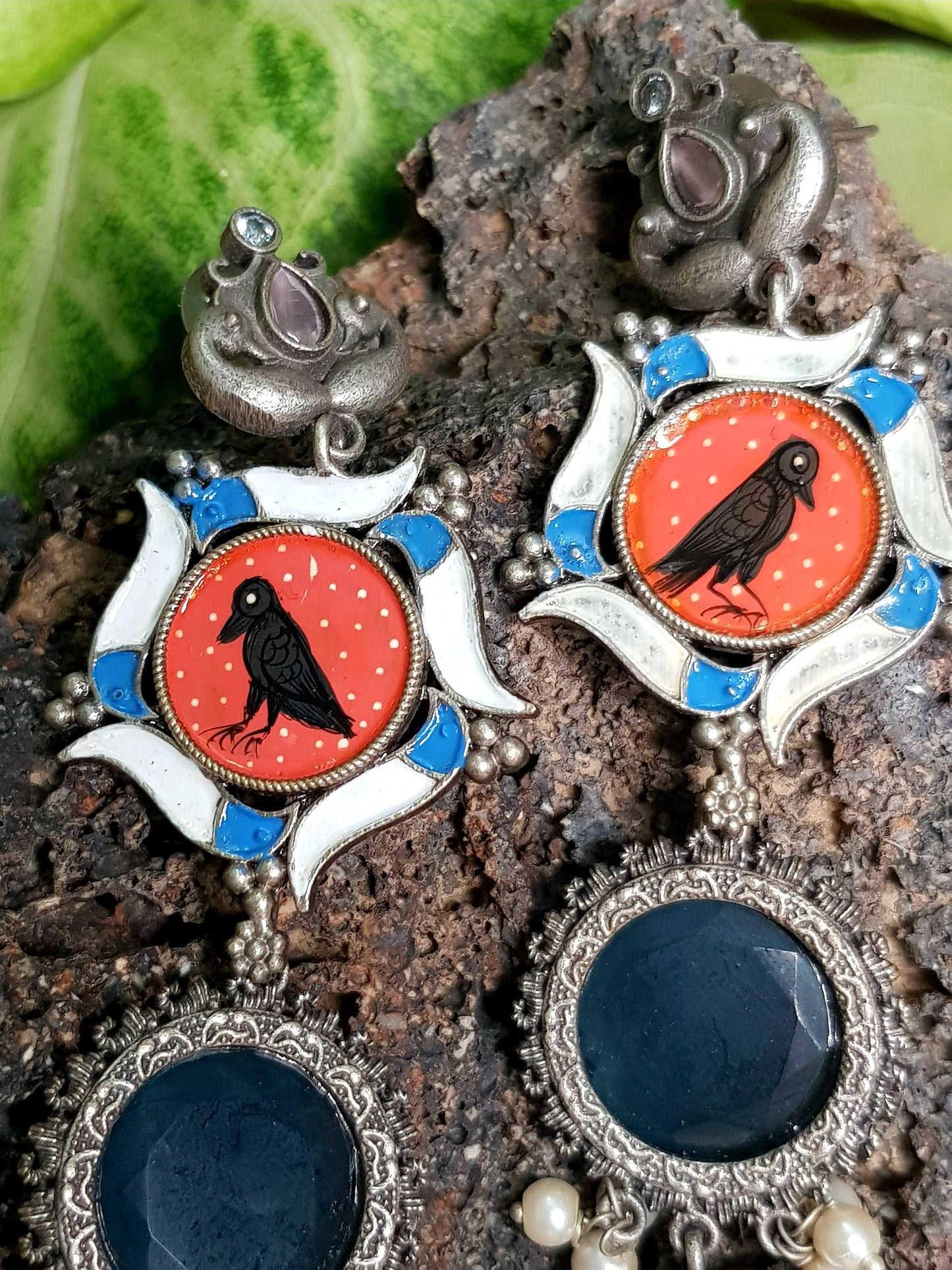 Silver finish,hand painted crow earrings in an interesting pattern