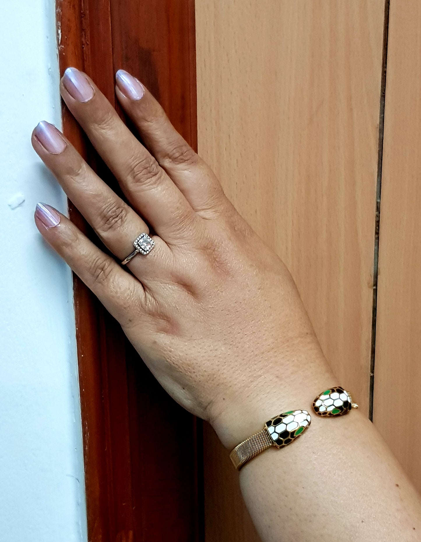 Smart snake head gold finish bracelet, white, black, green meenakari detailing