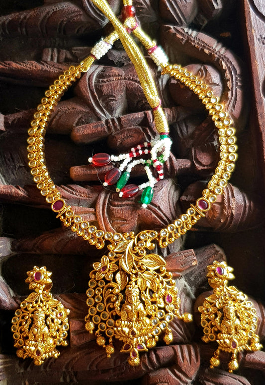 Temple jewelry set, necklace with Lakshmi motif pendant and green/red stones inlay, matching earrings