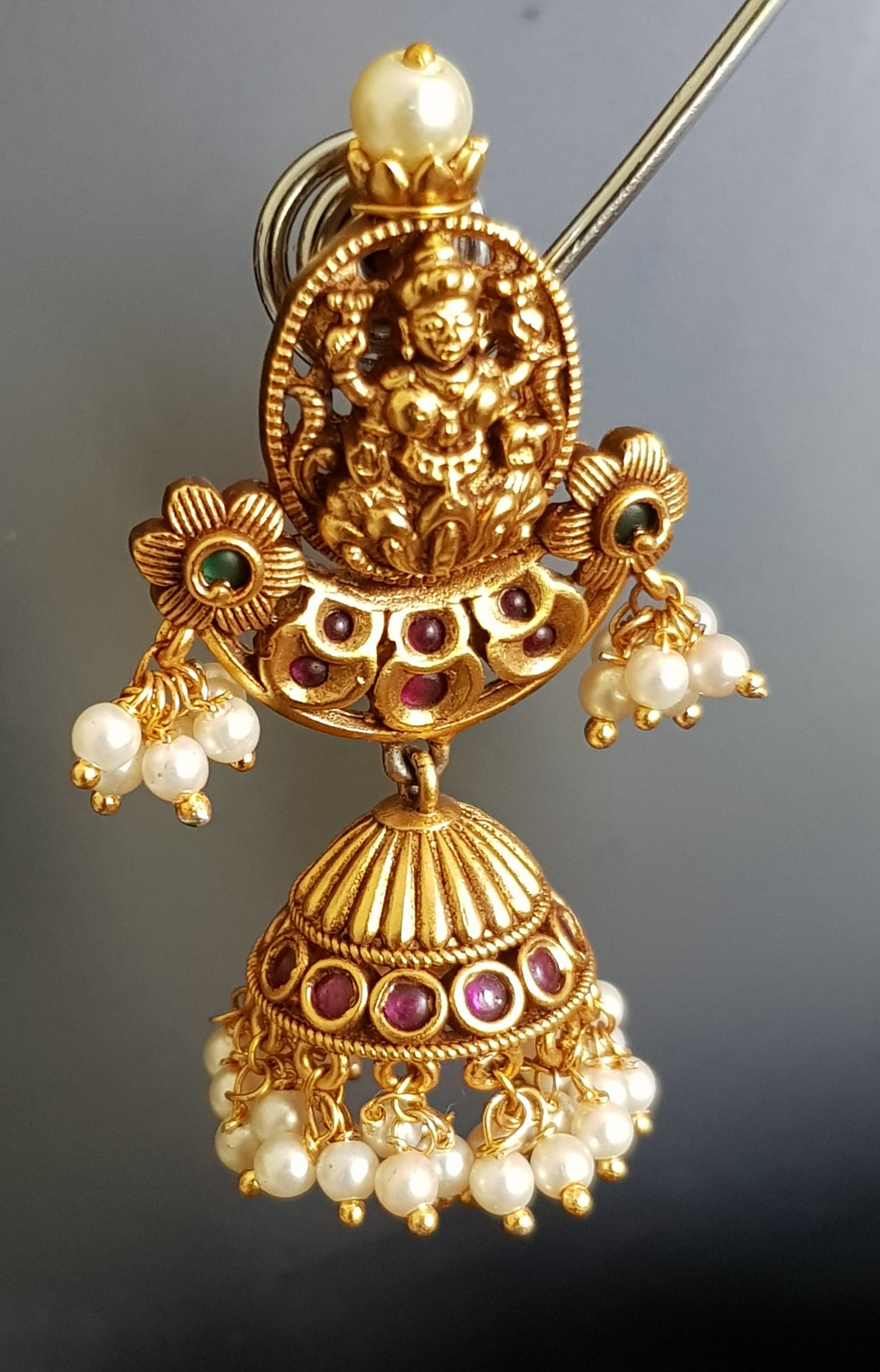 Temple jewelry set, necklace with Goddess Lakshmi motif and red stones detailing, matching jhumkas (earrings)