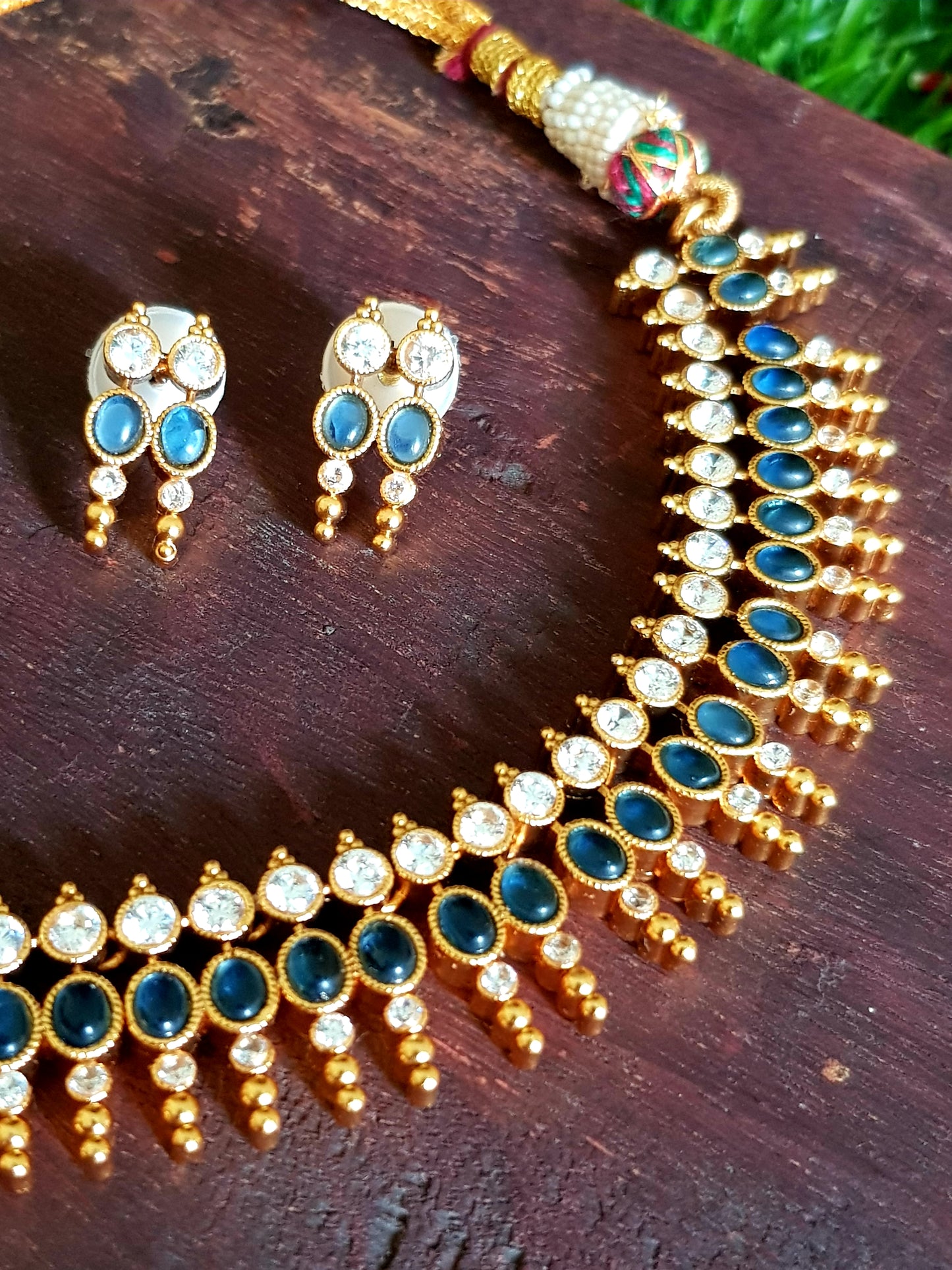 Gold finish set, sapphire and clear stone Kemp inlay with golden bead design, matching studs (earrings)