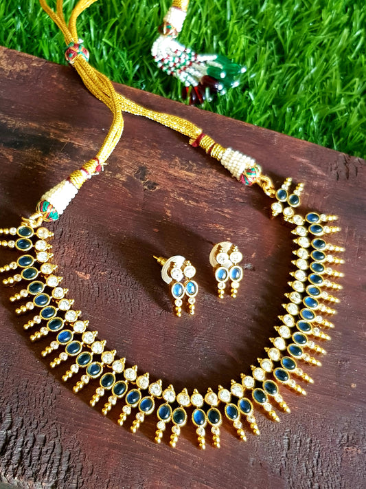 Gold finish set, sapphire and clear stone Kemp inlay with golden bead design, matching studs (earrings)