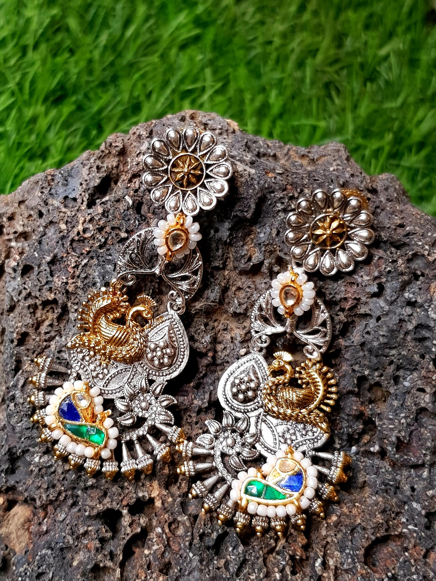 Dual tone green-blue/green-pink intricate work peacock meenakari long earrings