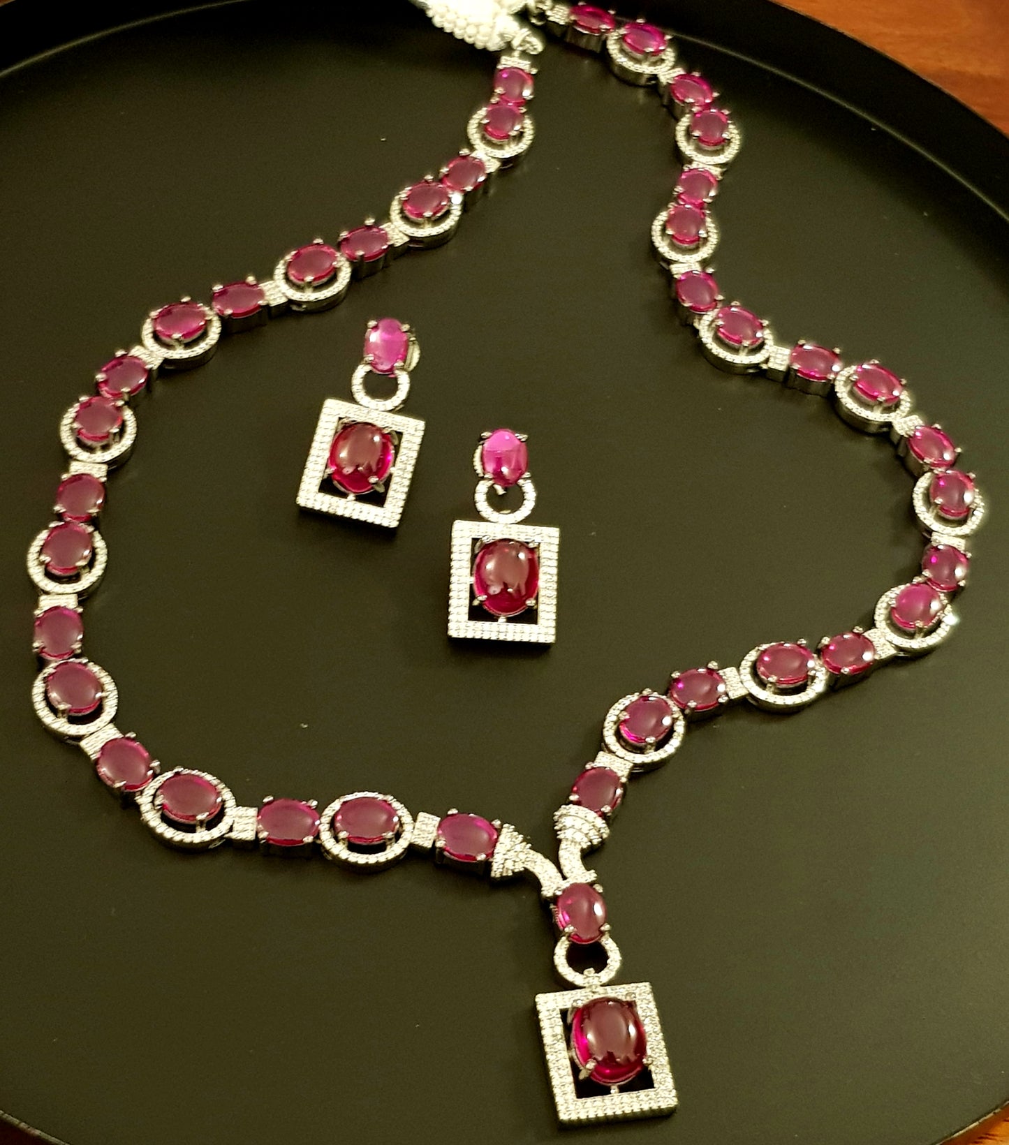 Platinum finish ruby stone and CZ set, long necklace and matching earrings