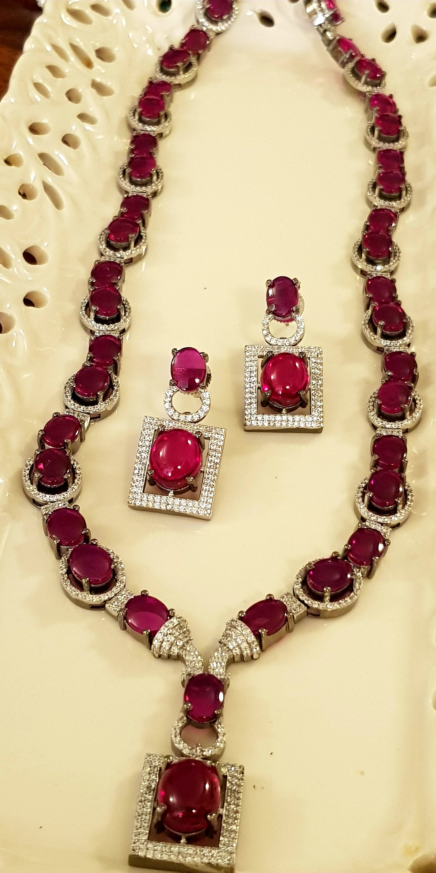 Platinum finish ruby stone and CZ set, long necklace and matching earrings