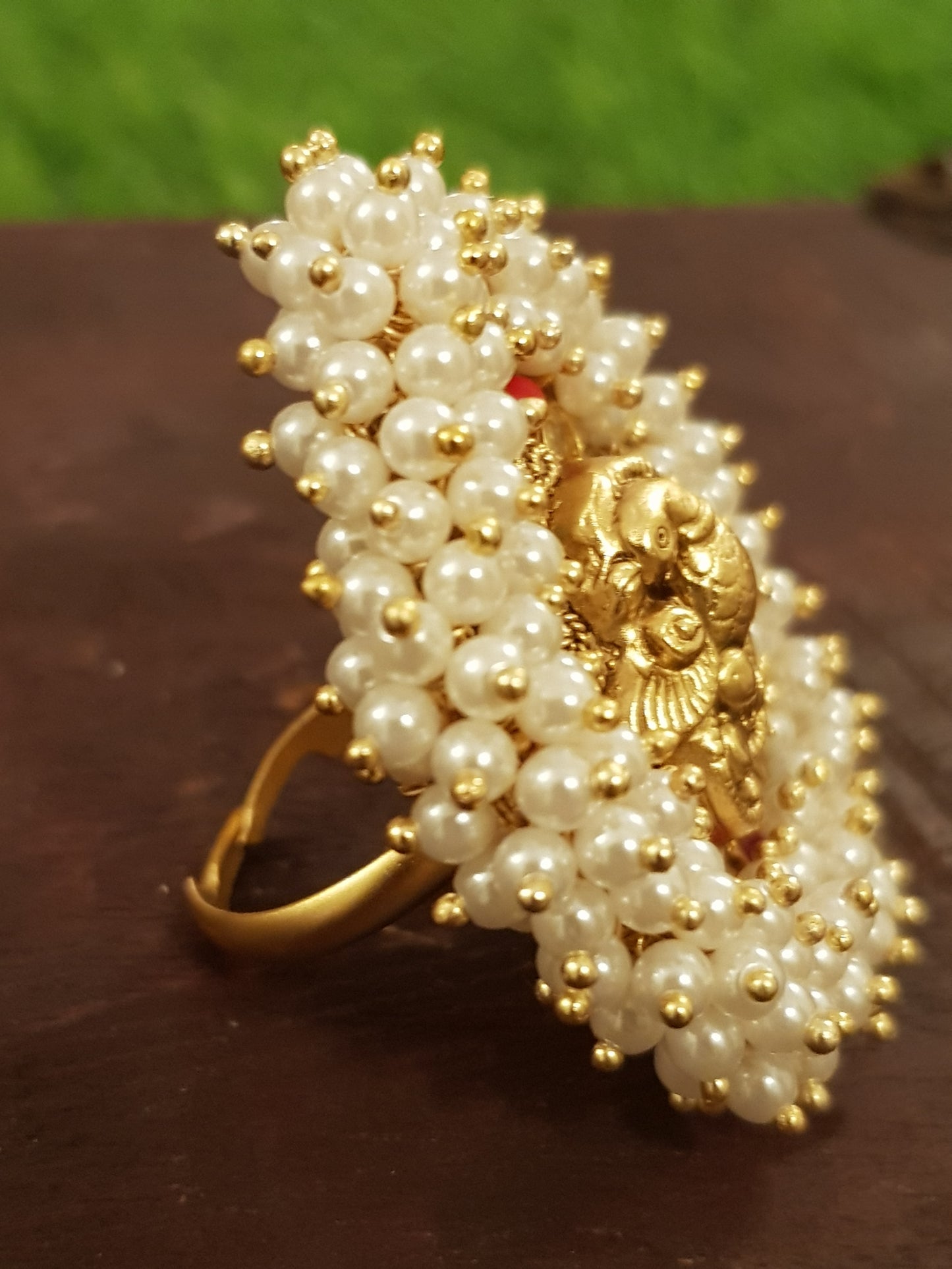 Temple jewelry parrot motif navratan ring with pearl cluster