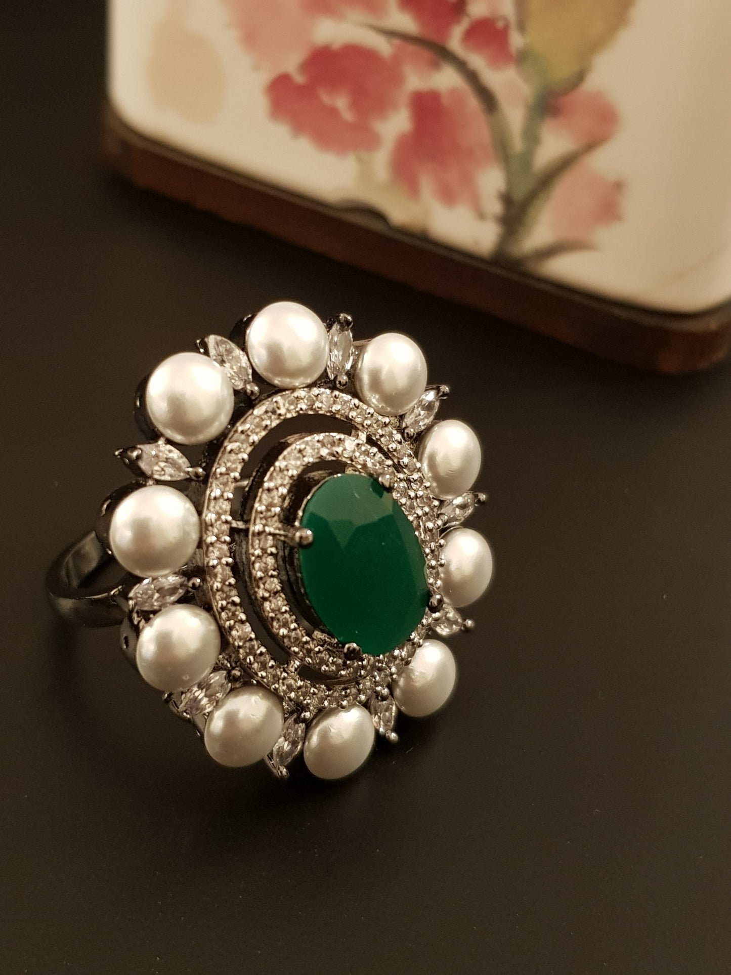 A victorian antique silver finish ring with ruby/emerald colour stone, pearl and CZ detailing