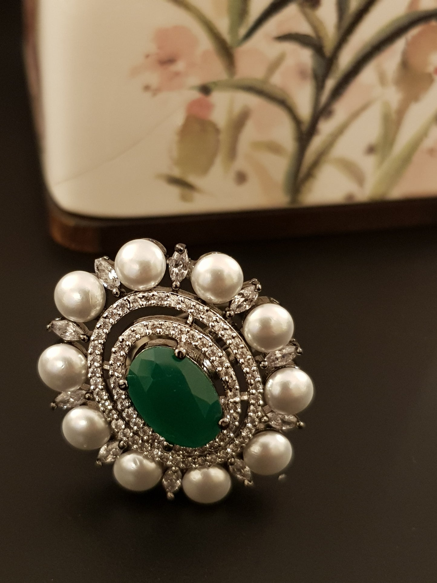 A victorian antique silver finish ring with ruby/emerald colour stone, pearl and CZ detailing