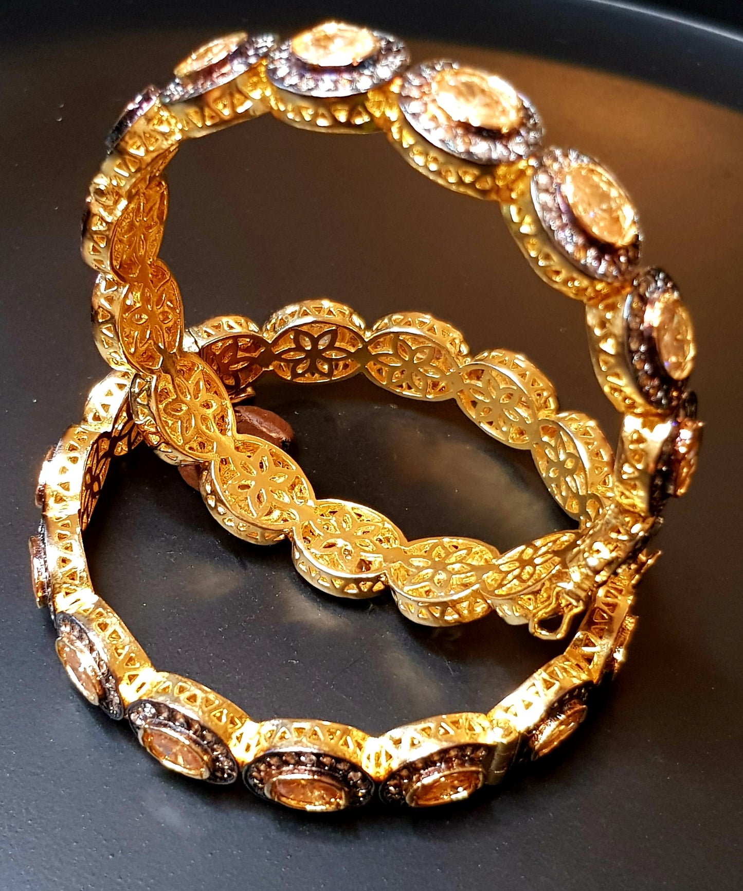 Gold finish bangle with oval topaz stones surrounded by CZ (2 pc) size-2.6