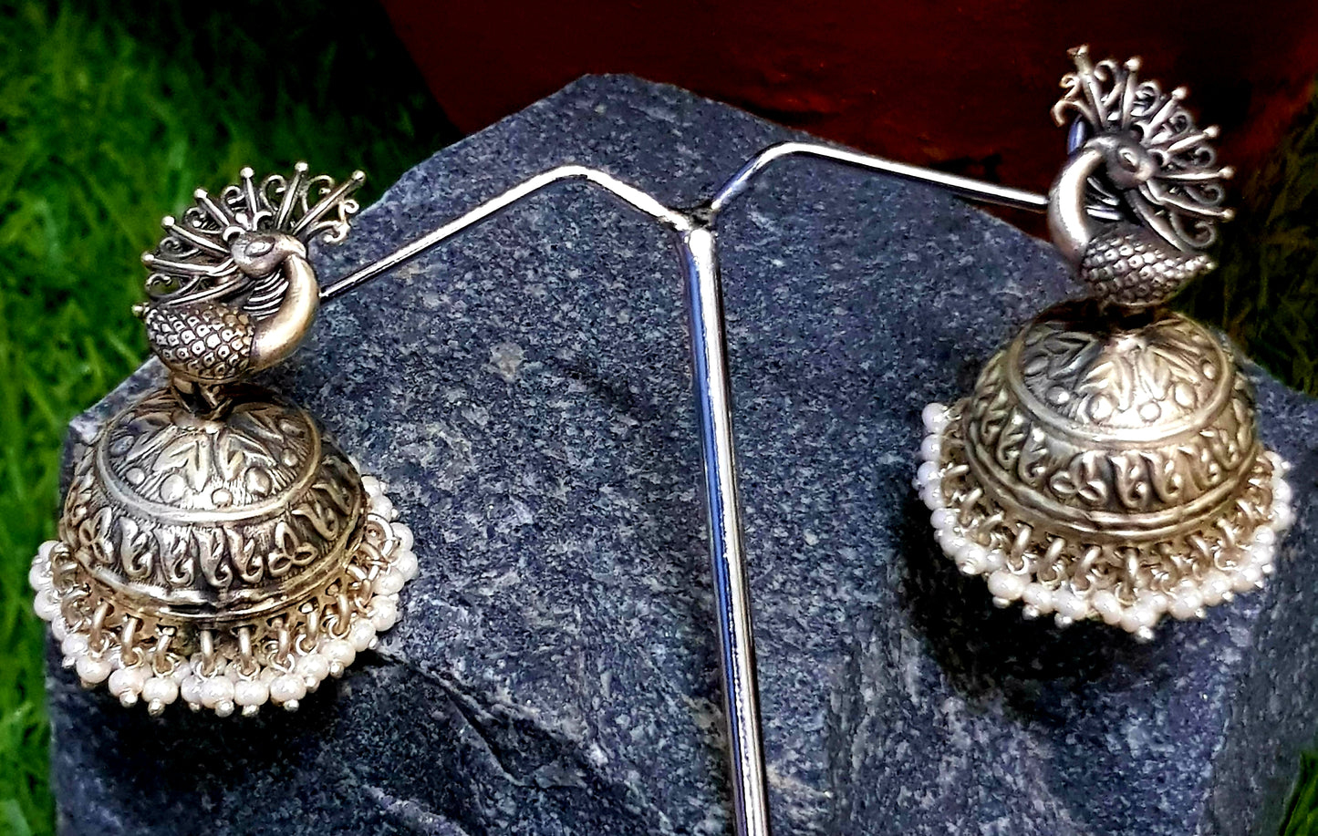 Silver peacock earrings (jhumkas) with pearls