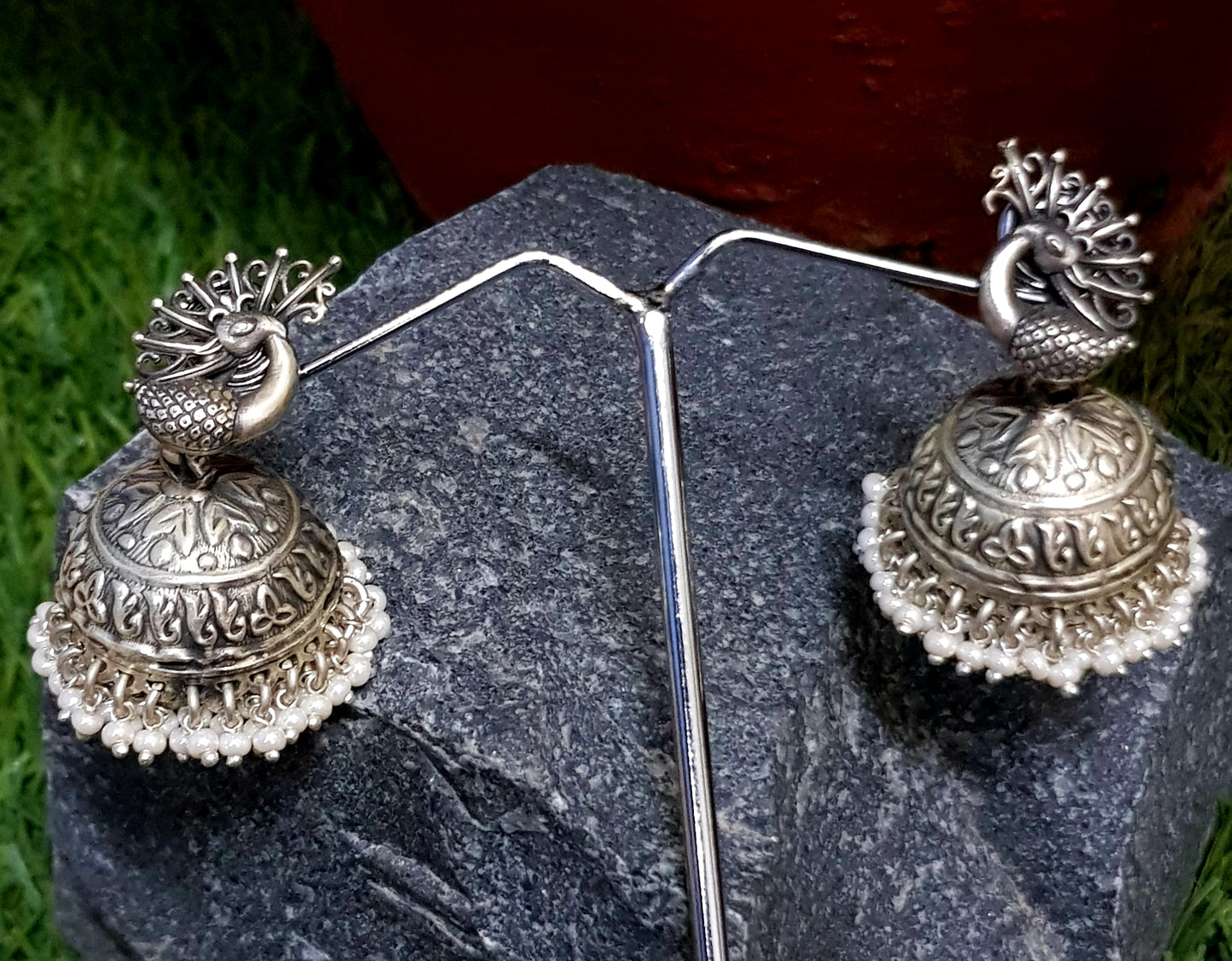 Silver peacock earrings (jhumkas) with pearls