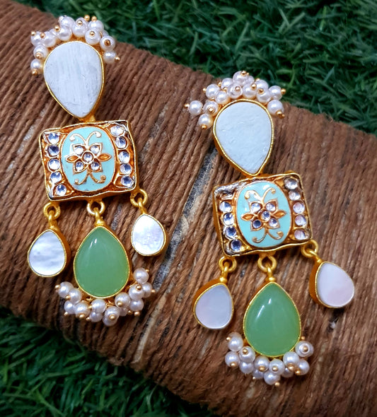 Gold finish earrings with meenakari,mother of pearl and pale green stone drops