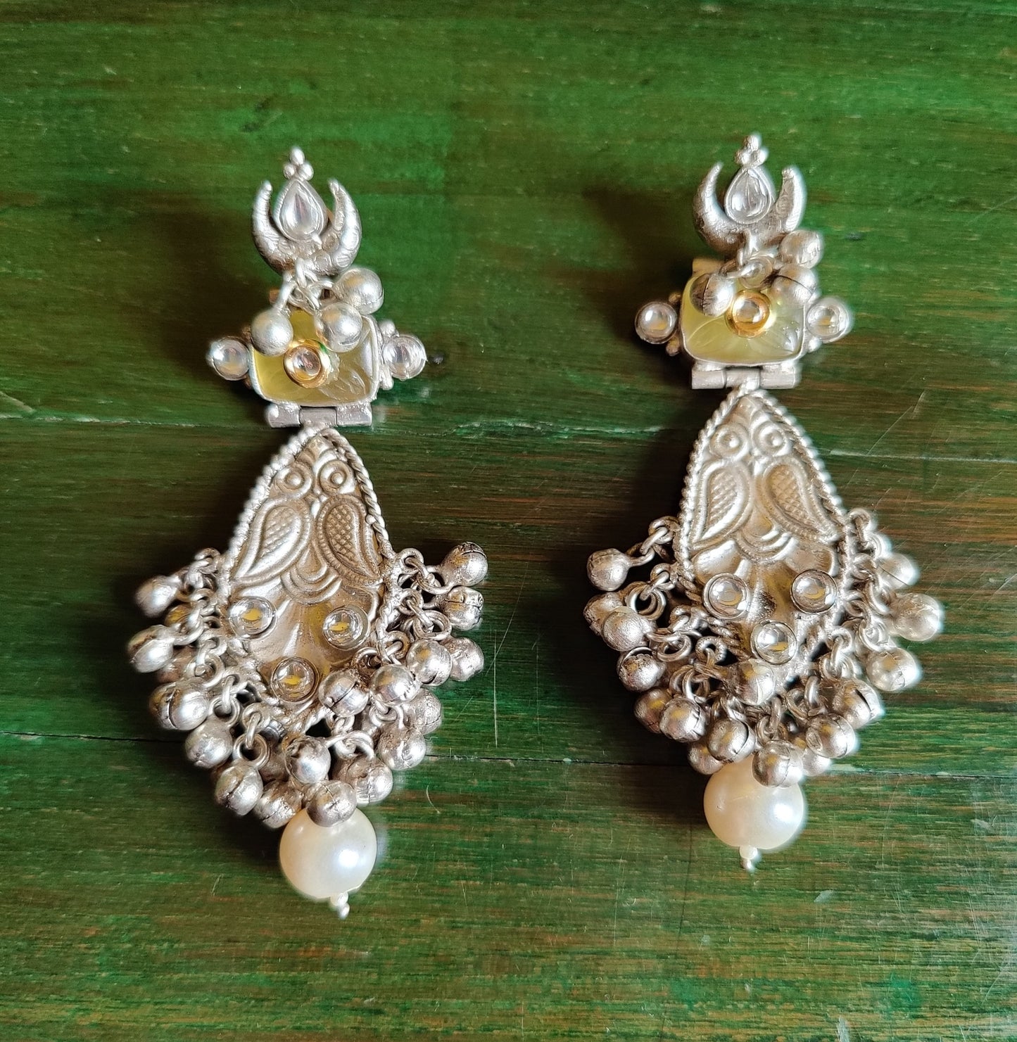 Silver finish earrings with yellow stone ,kundan and pearls