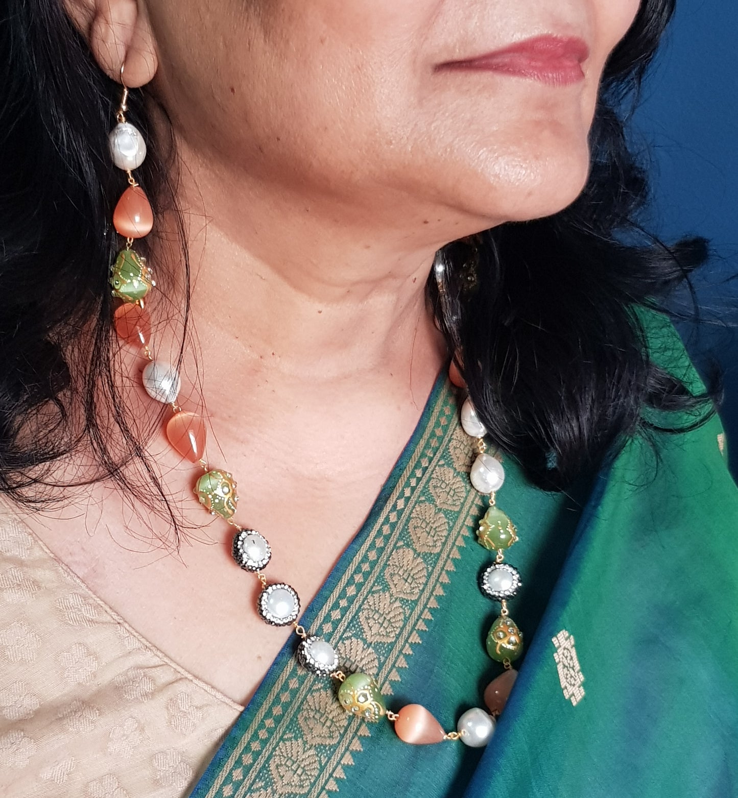 A multicoloured necklace set in baroque pearls,monalisa pearls,matching earrings