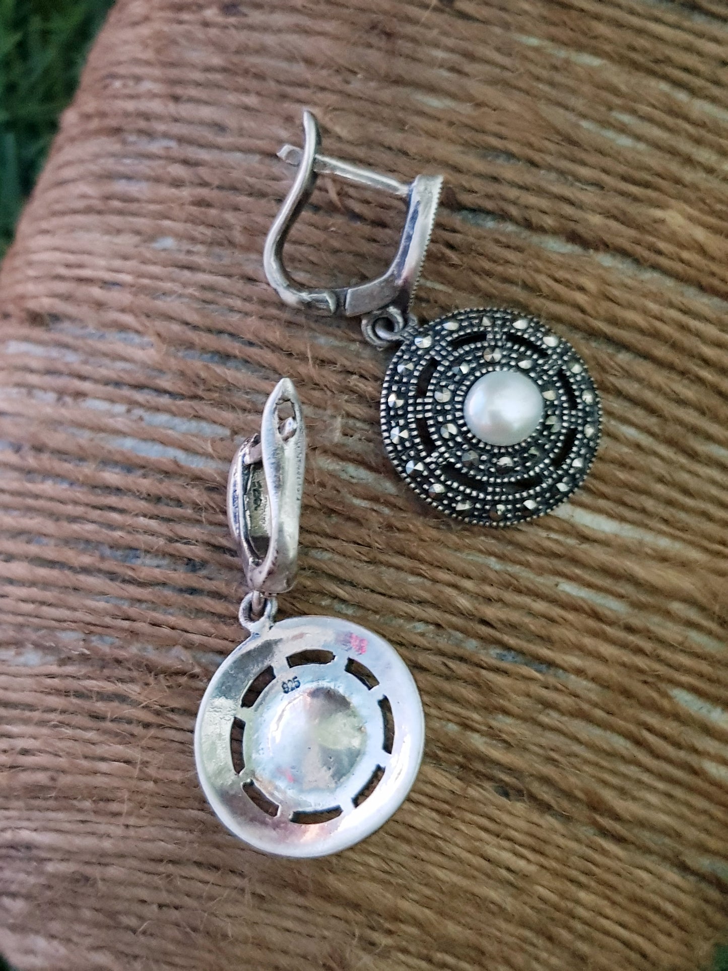 Silver hanging earrings, concentric circles with marcasite with pearl in center