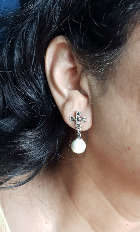 Silver earrings, hanging pearl on cross shaped marcasite studs