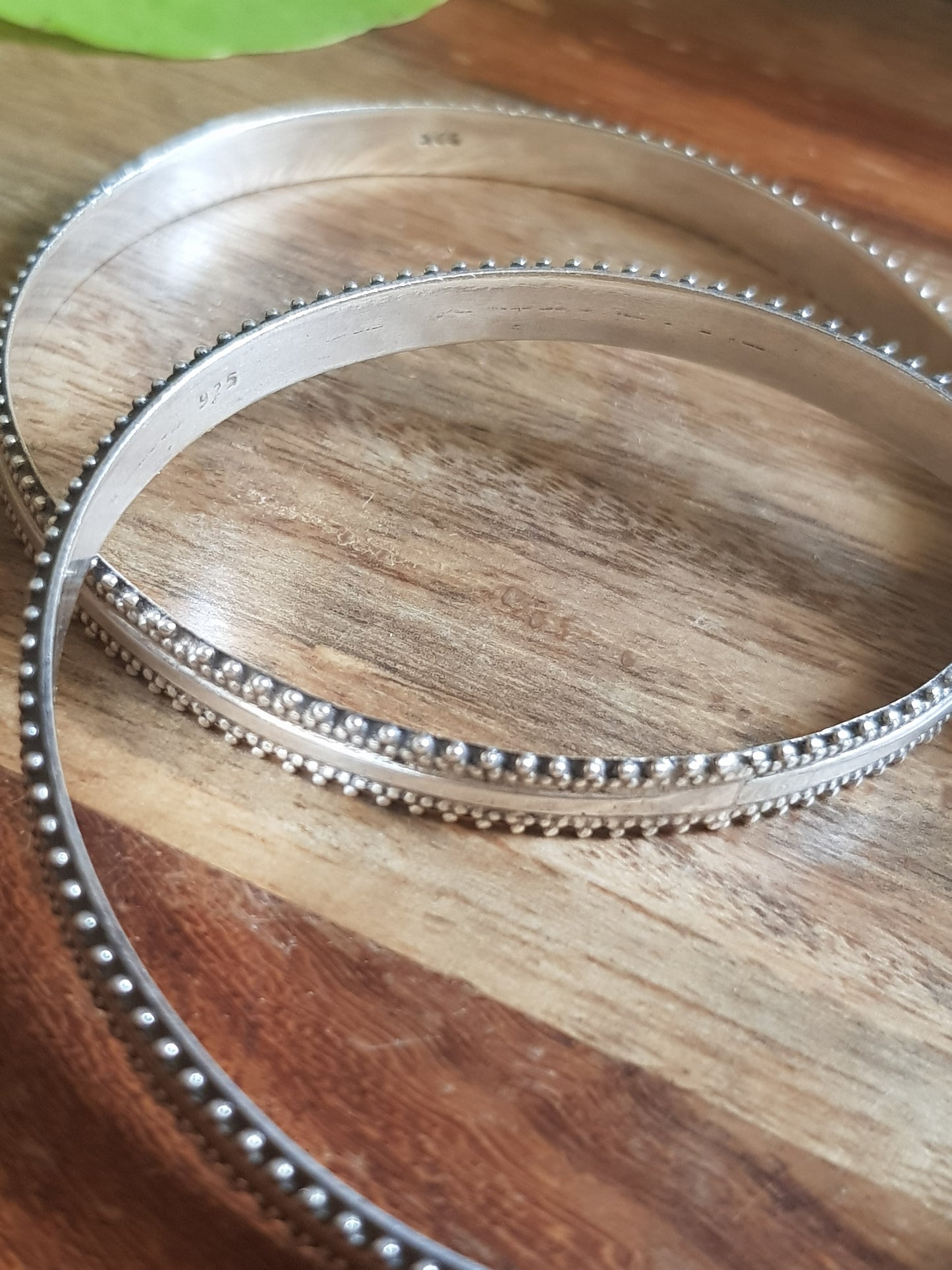 Silver bangles, plain center with work on the edges (2 pcs) size 2.6