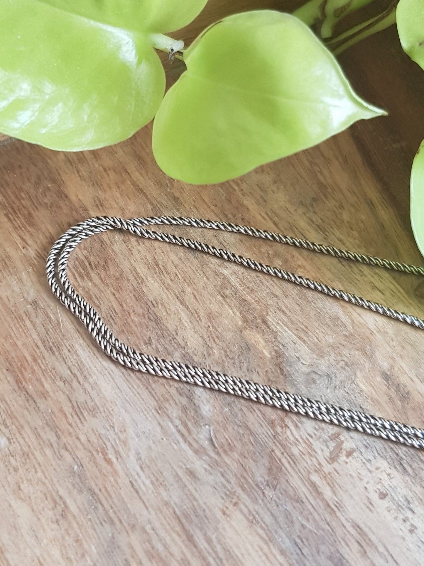 Silver chain necklace with thin rope design