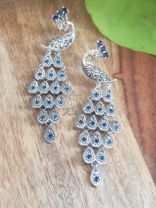 Silver peacock dangler earrings (earrings) with stones