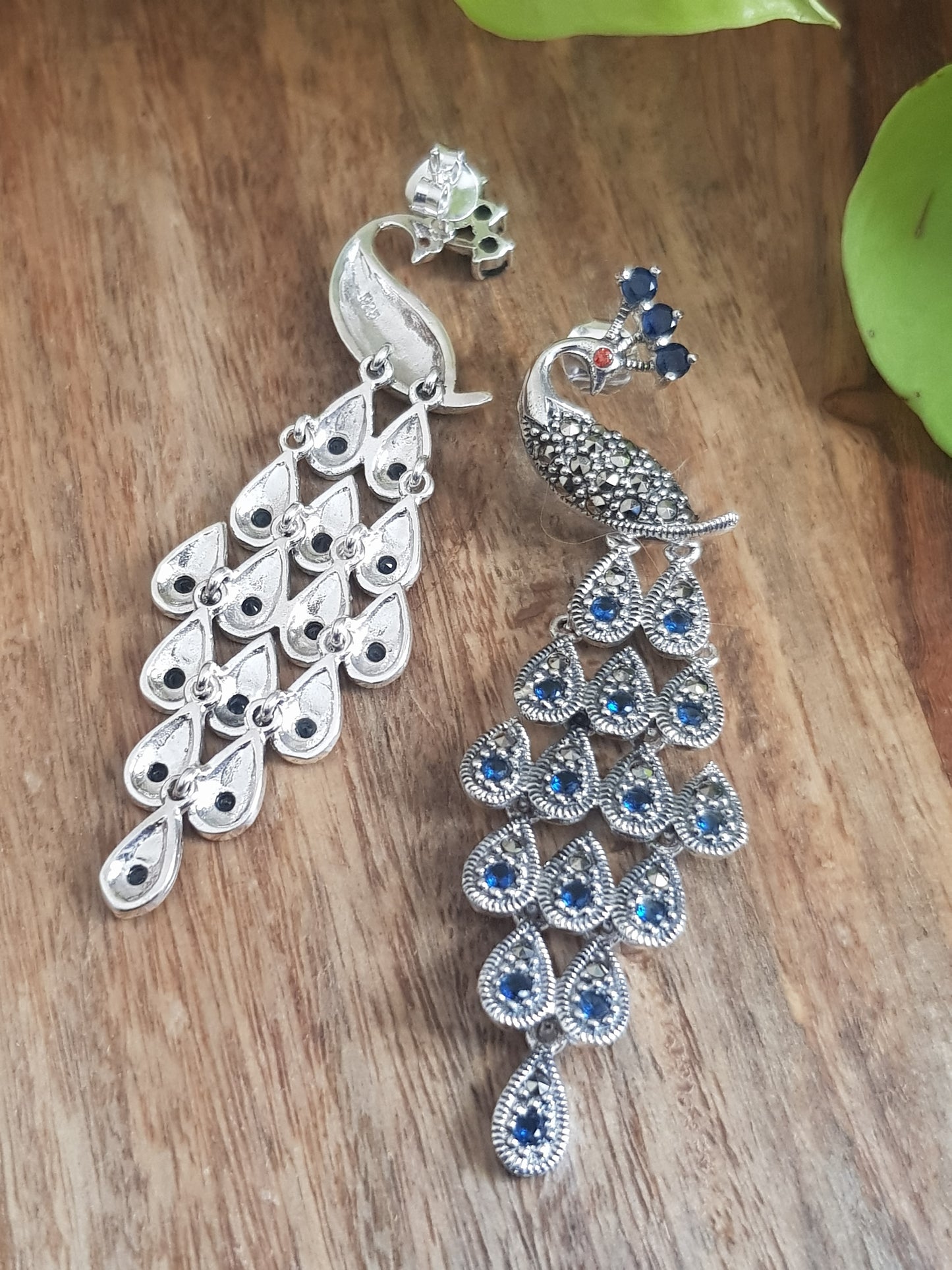 Silver peacock dangler earrings (earrings) with stones