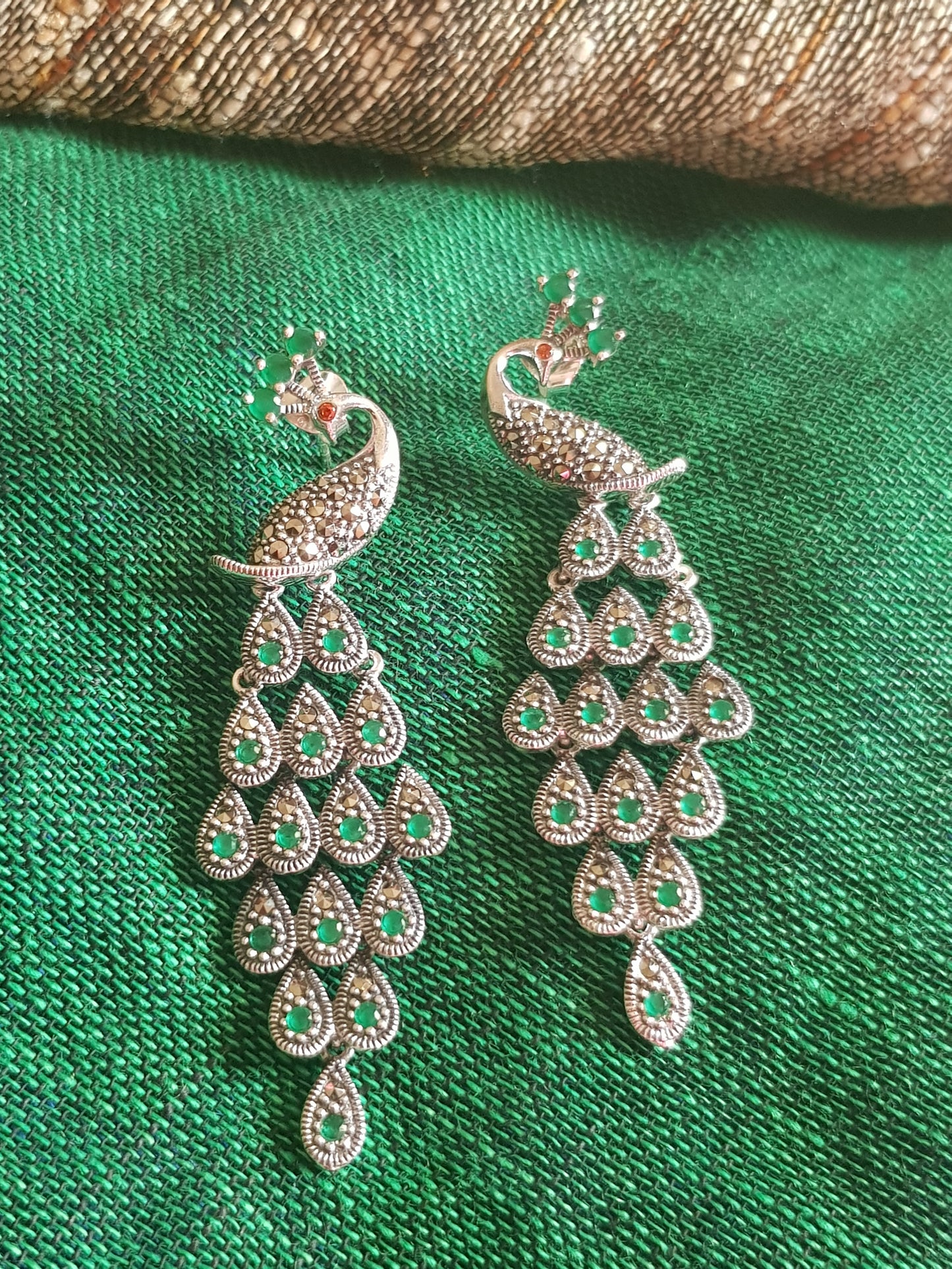 Silver peacock dangler earrings (earrings) with stones