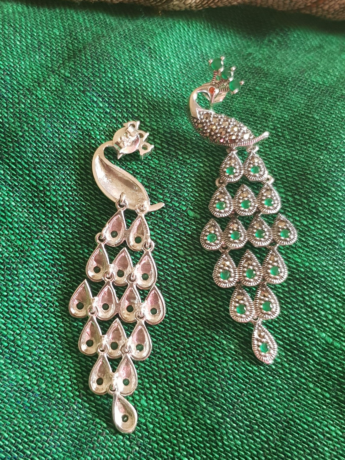 Silver peacock dangler earrings (earrings) with stones