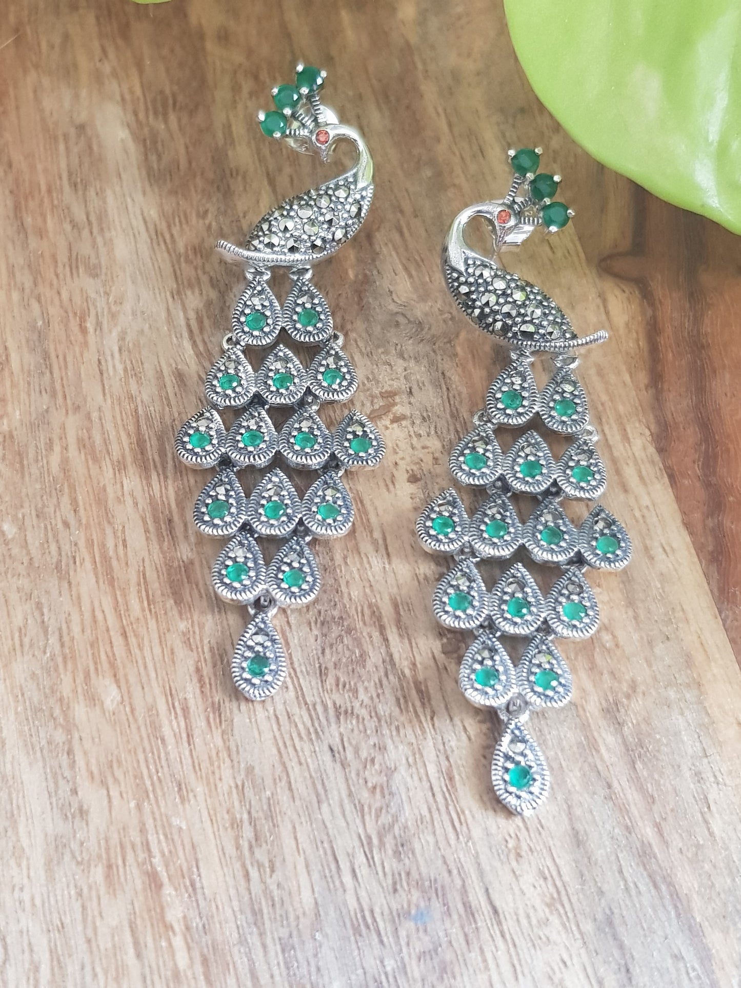 Silver peacock dangler earrings (earrings) with stones