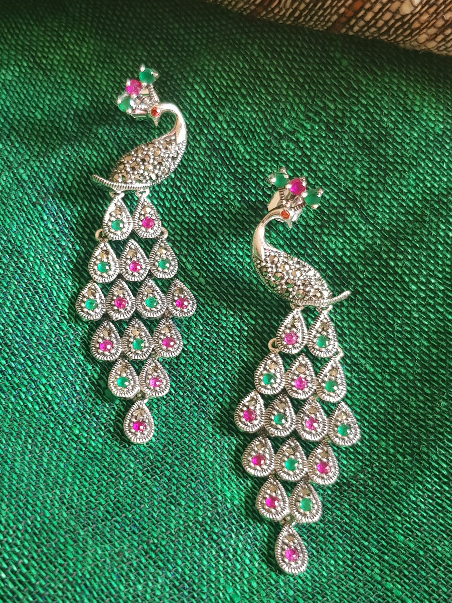 Silver peacock dangler earrings (earrings) with stones