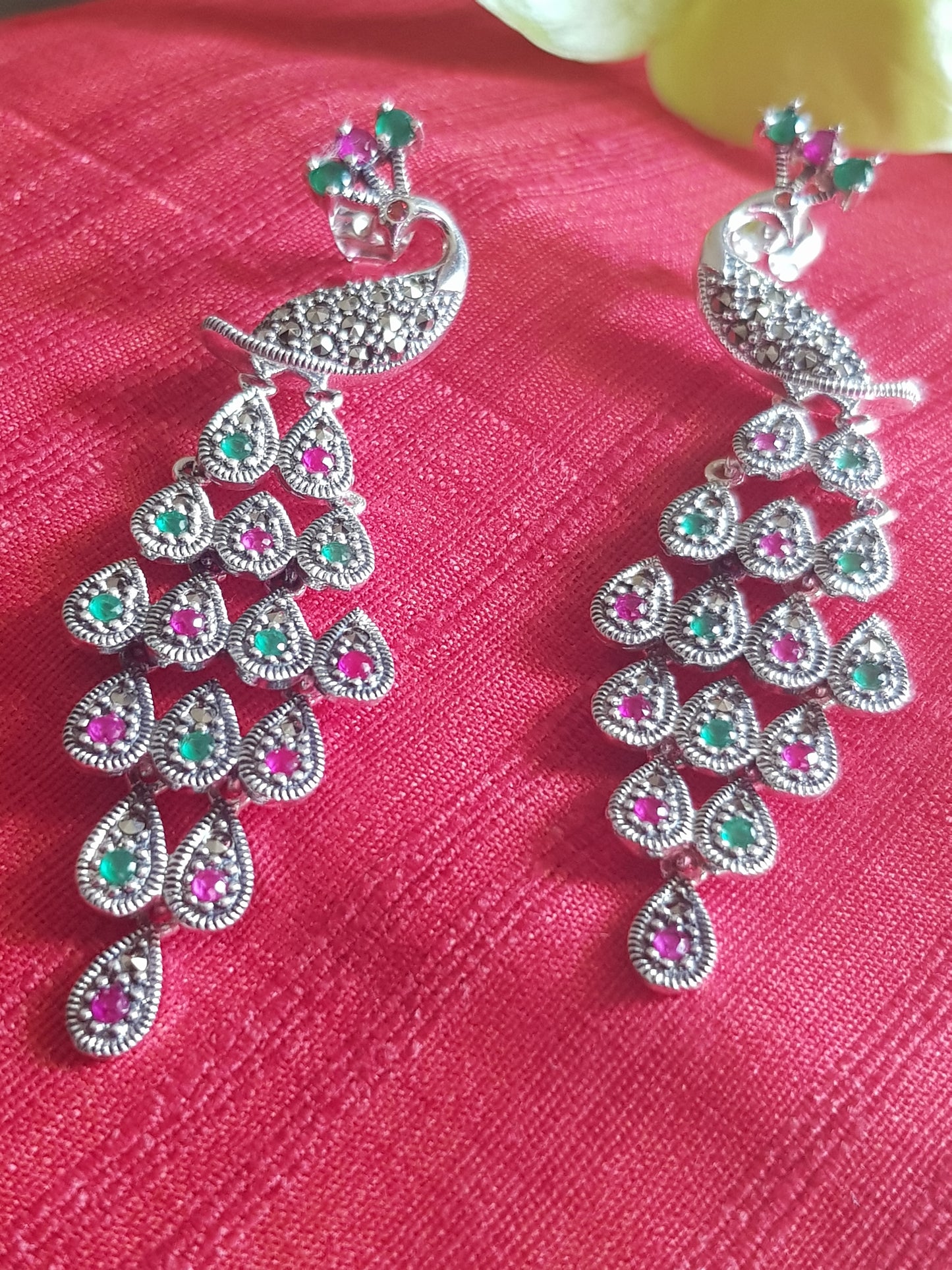 Silver peacock dangler earrings (earrings) with stones