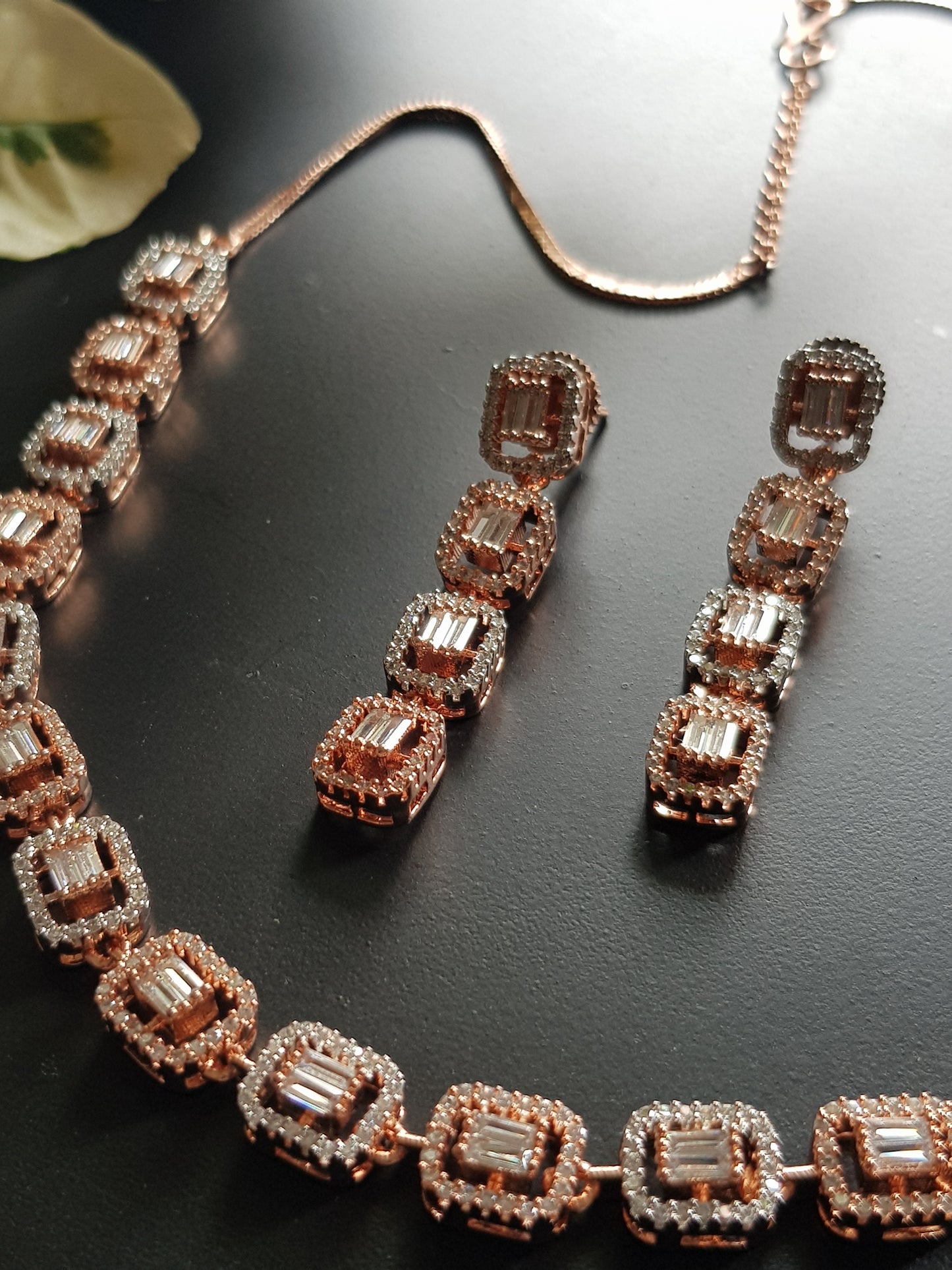 Rose gold/antique white and rose gold finish set in rectangular pattern CZ setting, matching danglers (earrings)