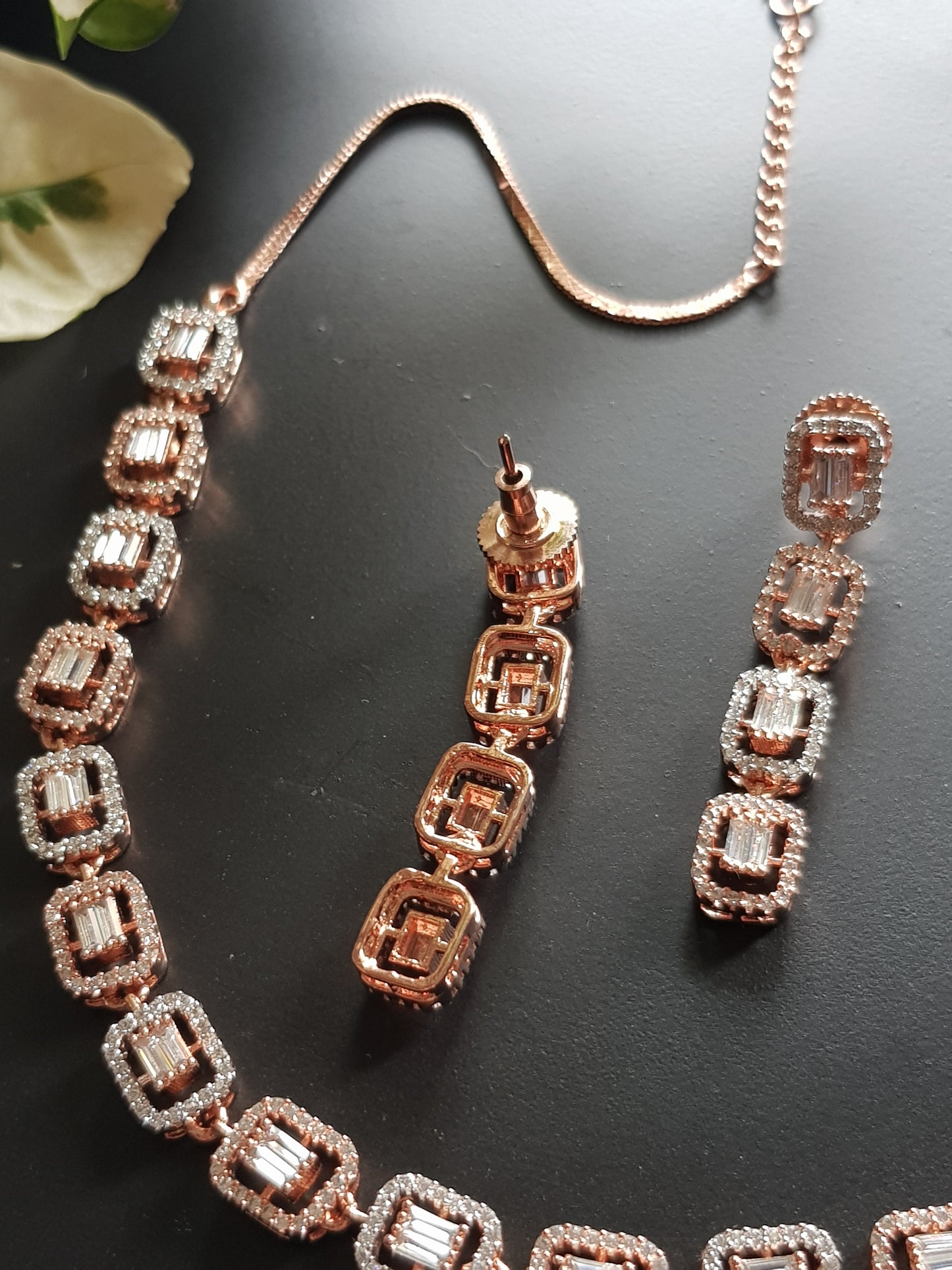 Rose gold/antique white and rose gold finish set in rectangular pattern CZ setting, matching danglers (earrings)