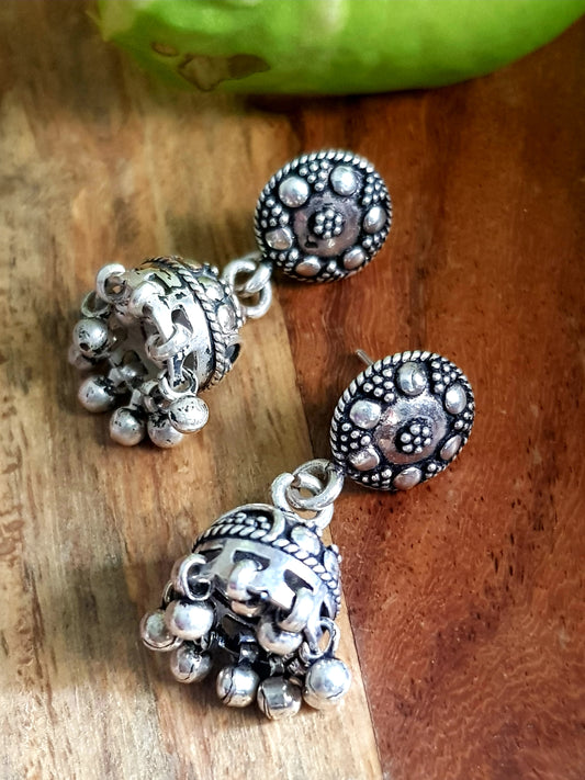 Silver jhumkis (earrings) with hanging beads on studs