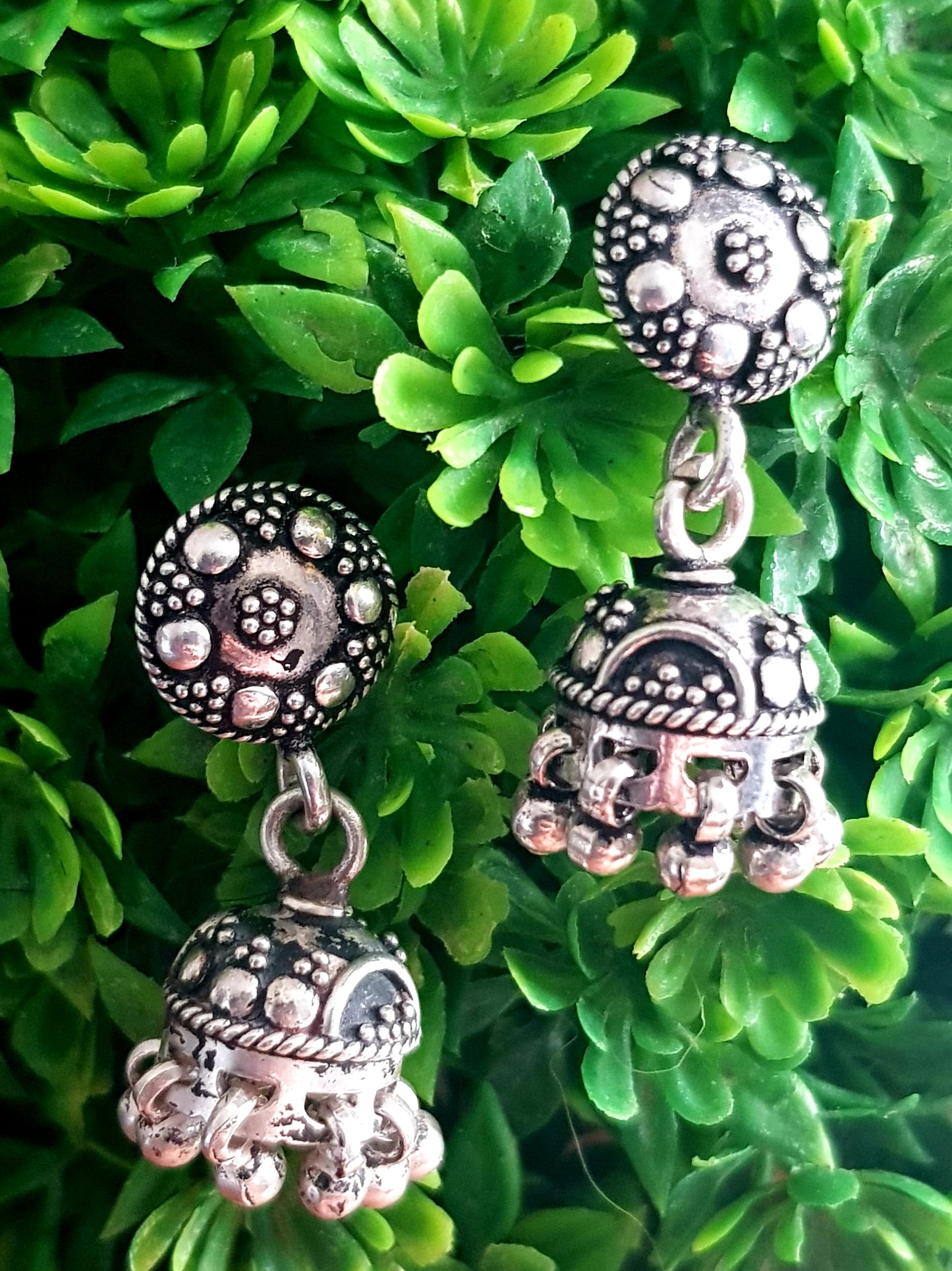 Silver jhumkis (earrings) with hanging beads on studs