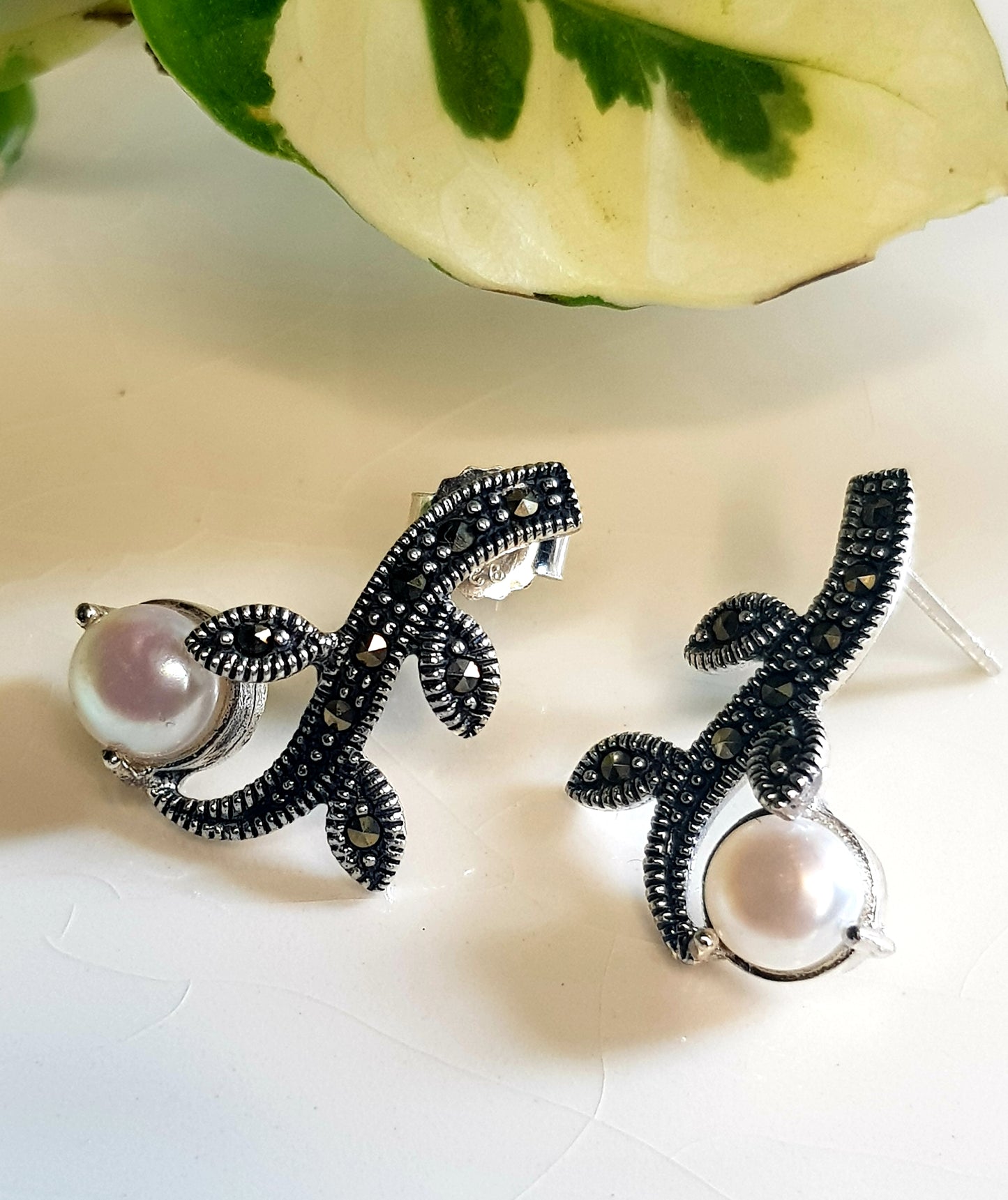 Silver earrings, twig shaped design with pearls and marcasite