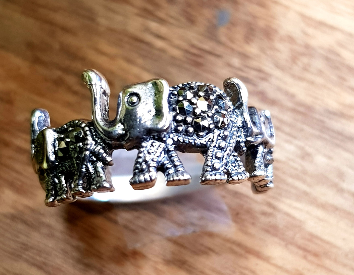 Silver ring, marching elephants design with marcasite detailing