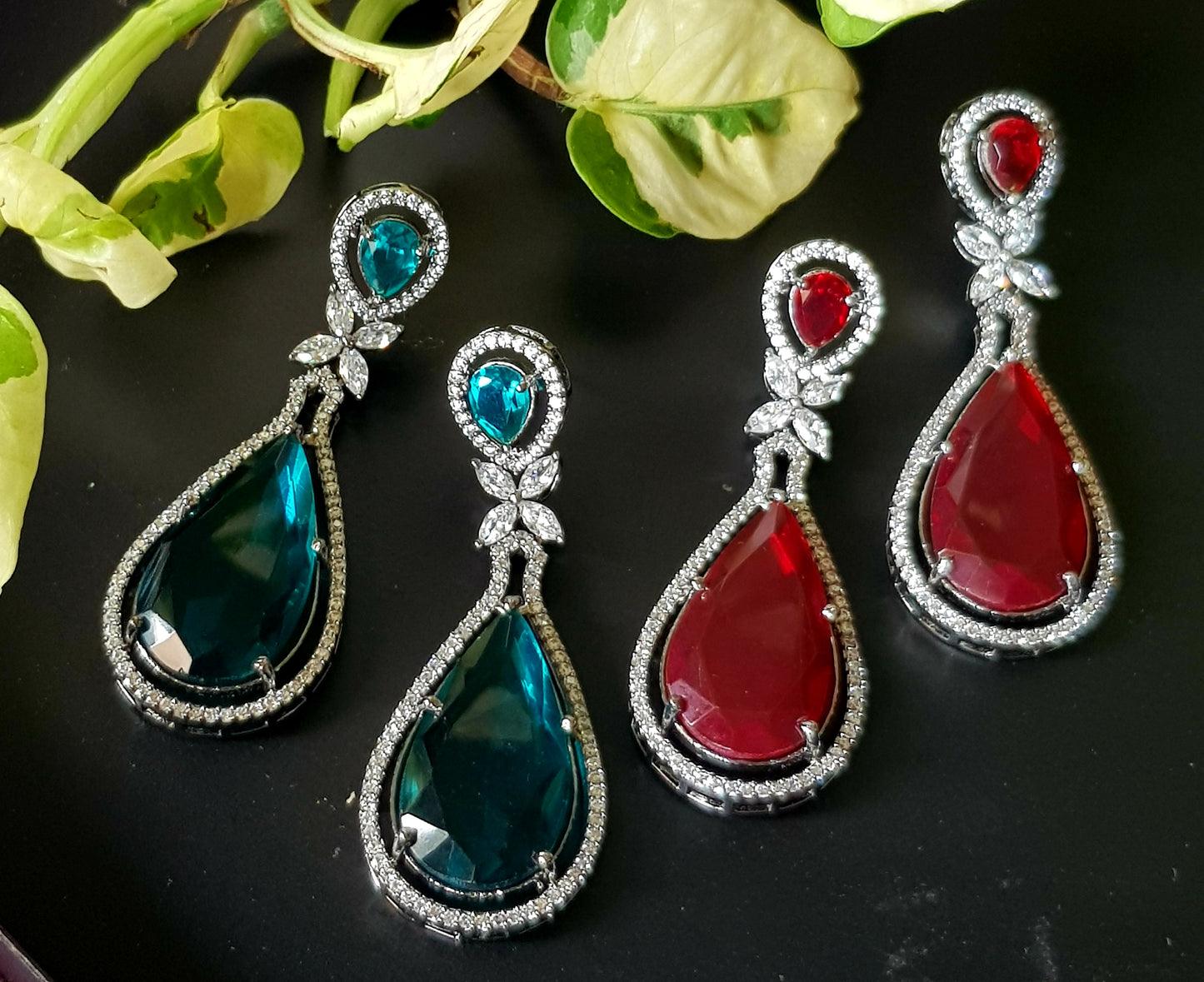 Antique finish long earrings with deep red/dark aqua blue stone and CZ detailing