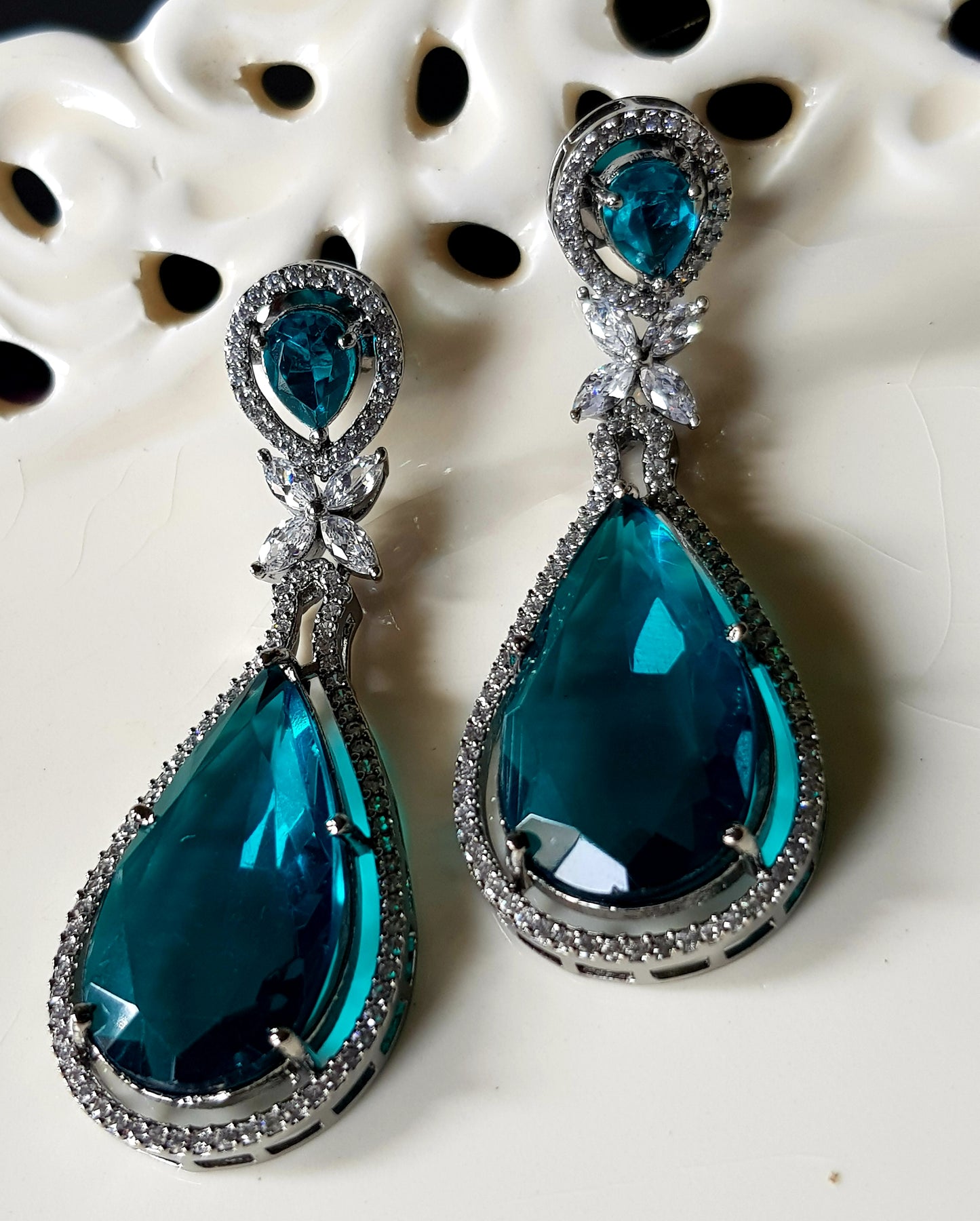 Antique finish long earrings with deep red/dark aqua blue stone and CZ detailing