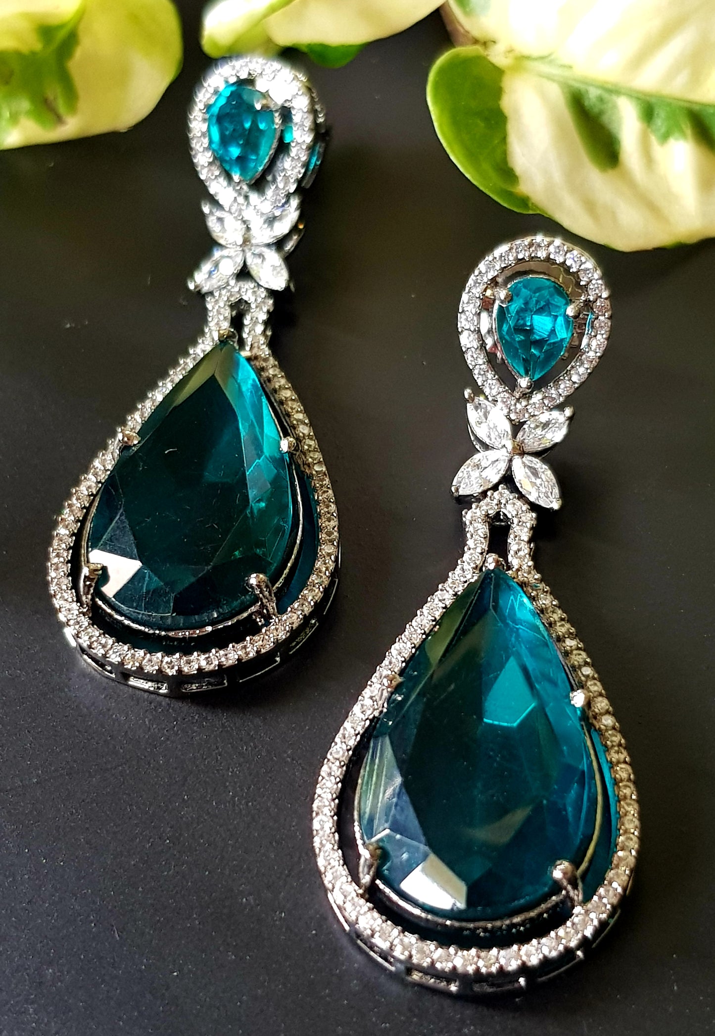 Antique finish long earrings with deep red/dark aqua blue stone and CZ detailing