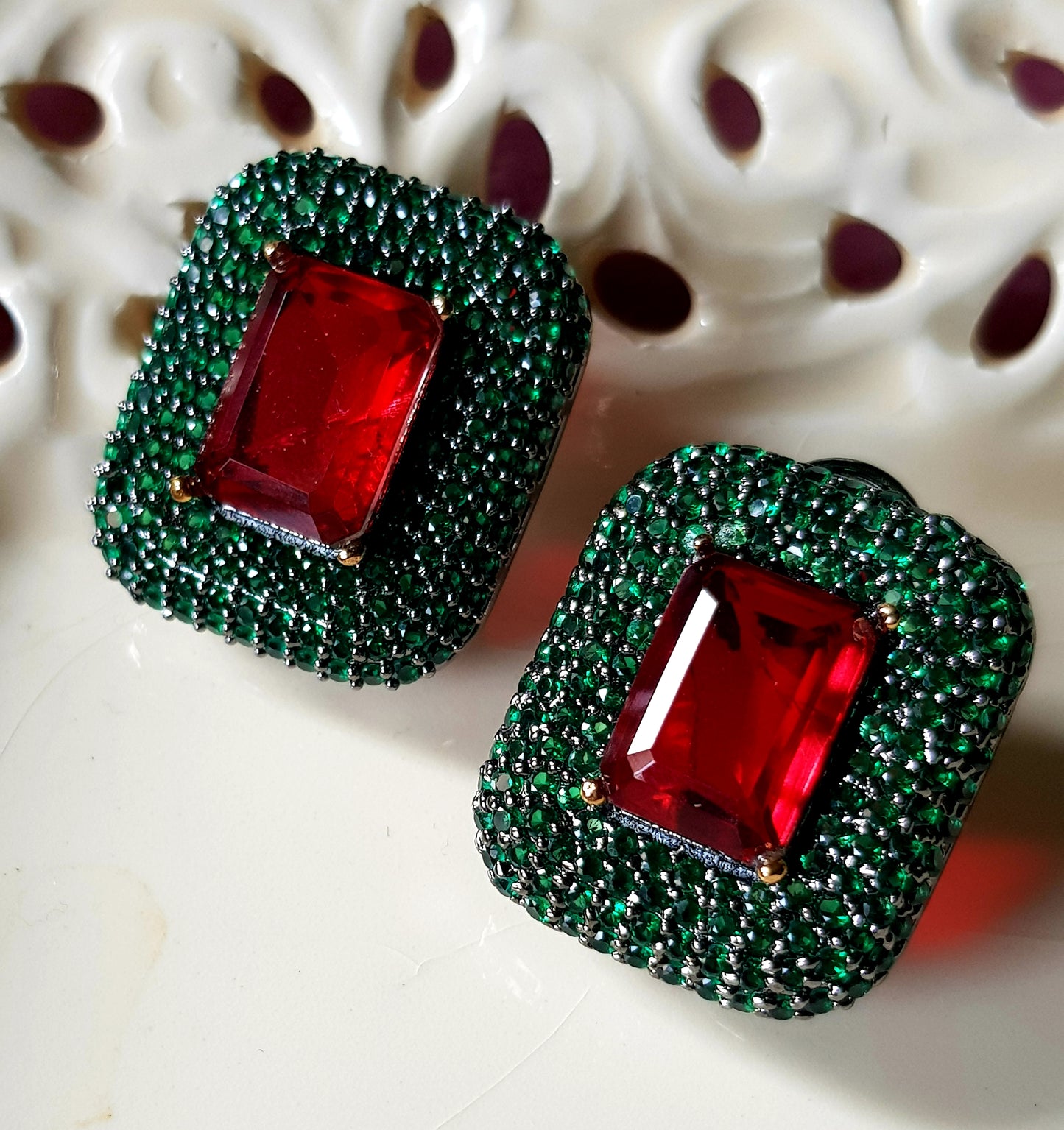 Antique finish vintage studs (earrings), ruby stone in center with emerald detailing around