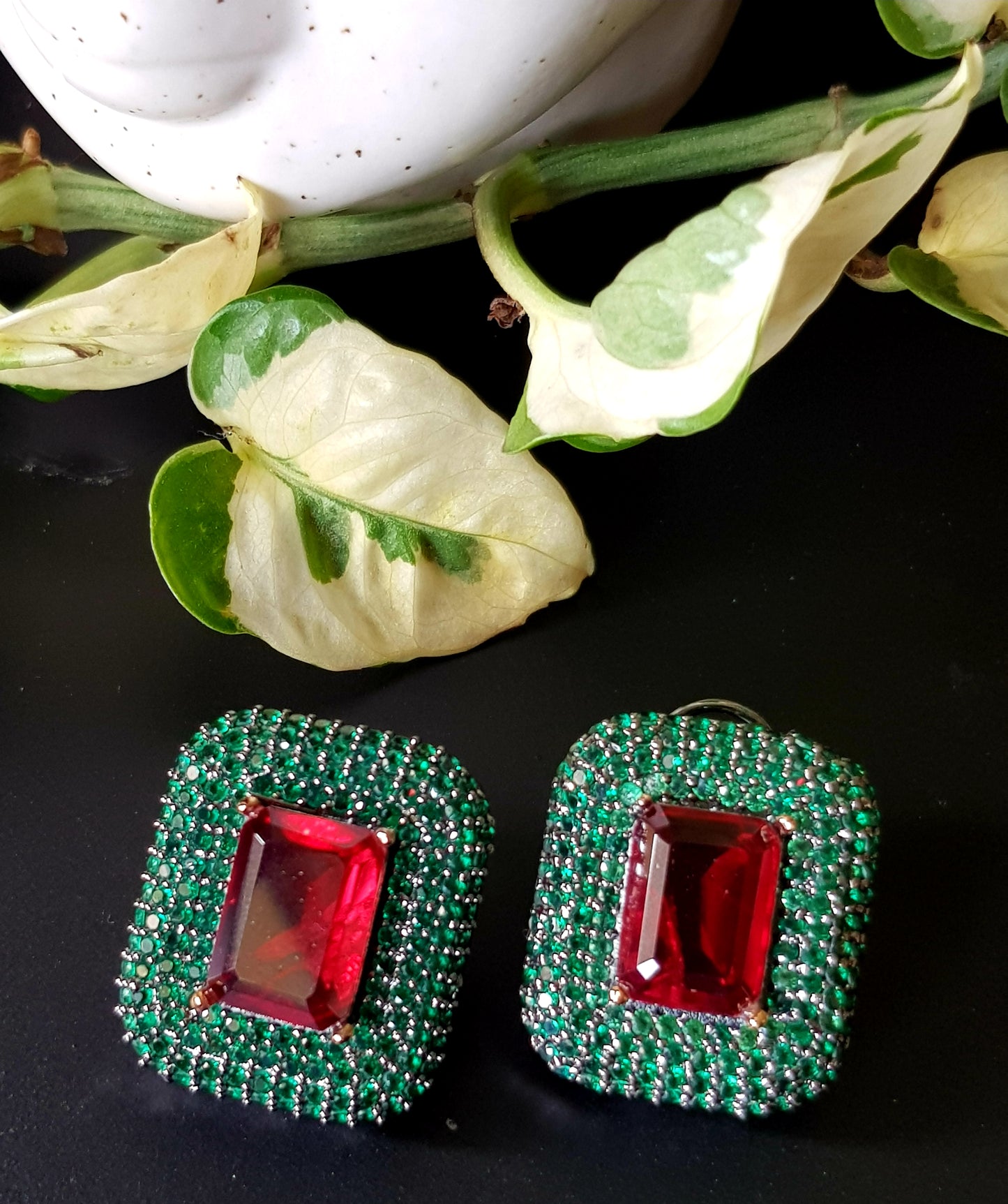 Antique finish vintage studs (earrings), ruby stone in center with emerald detailing around