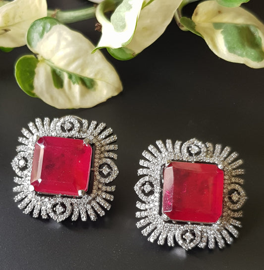 Antique finish studs (earrings), big ruby/topaz colour stone in the center with CZ detailing