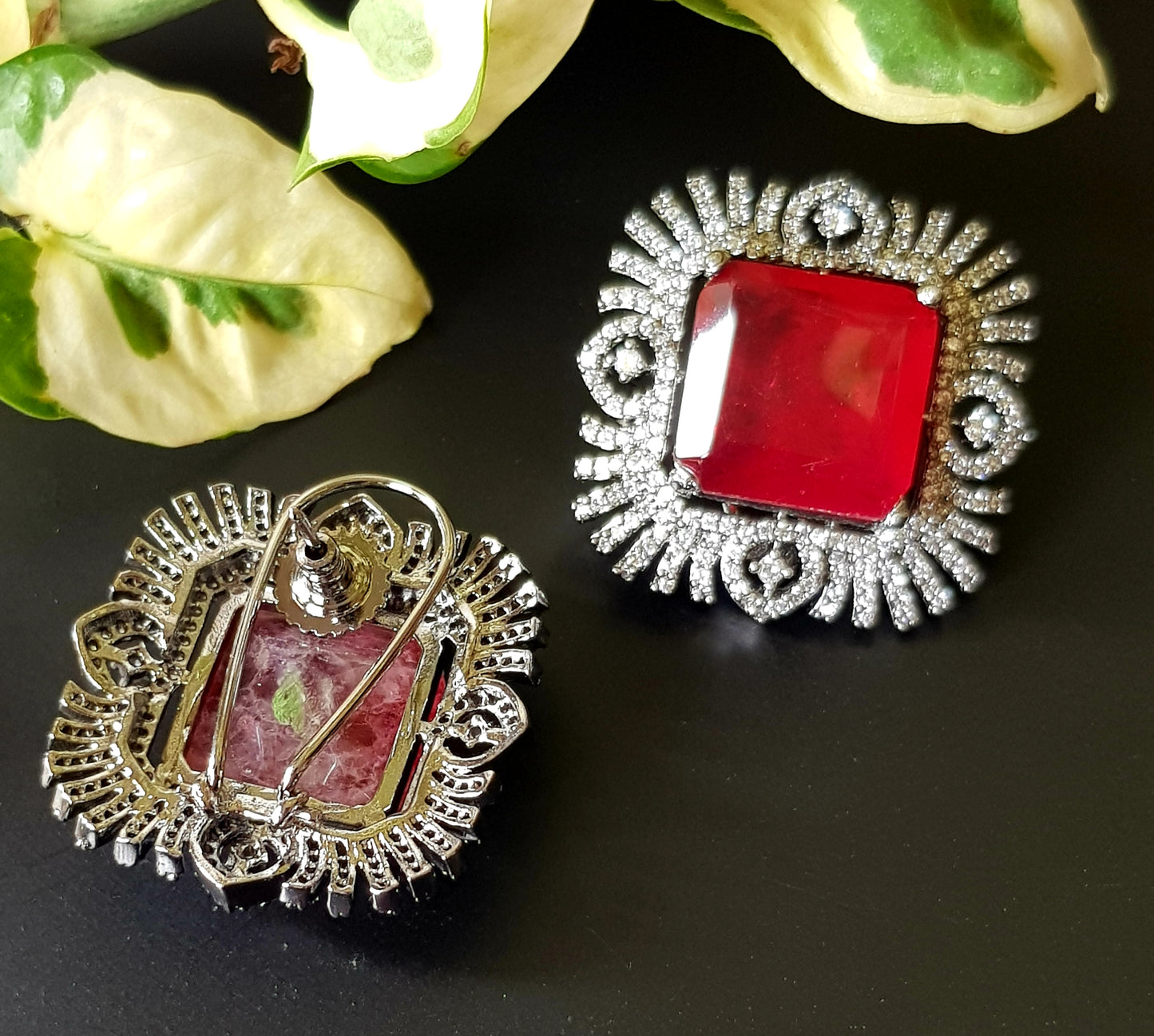 Antique finish studs (earrings), big ruby/topaz colour stone in the center with CZ detailing