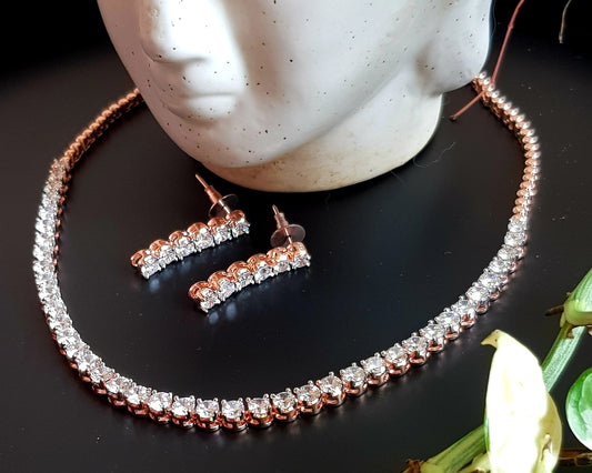 Platinum/gold/rose gold finish set, single CZ strand , matching earrings