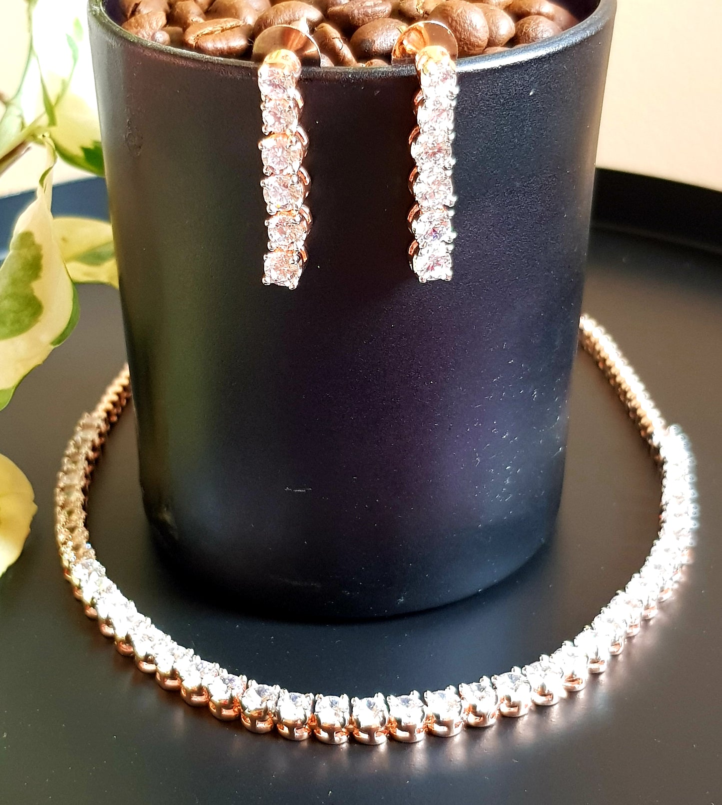 Platinum/gold/rose gold finish set, single CZ strand , matching earrings