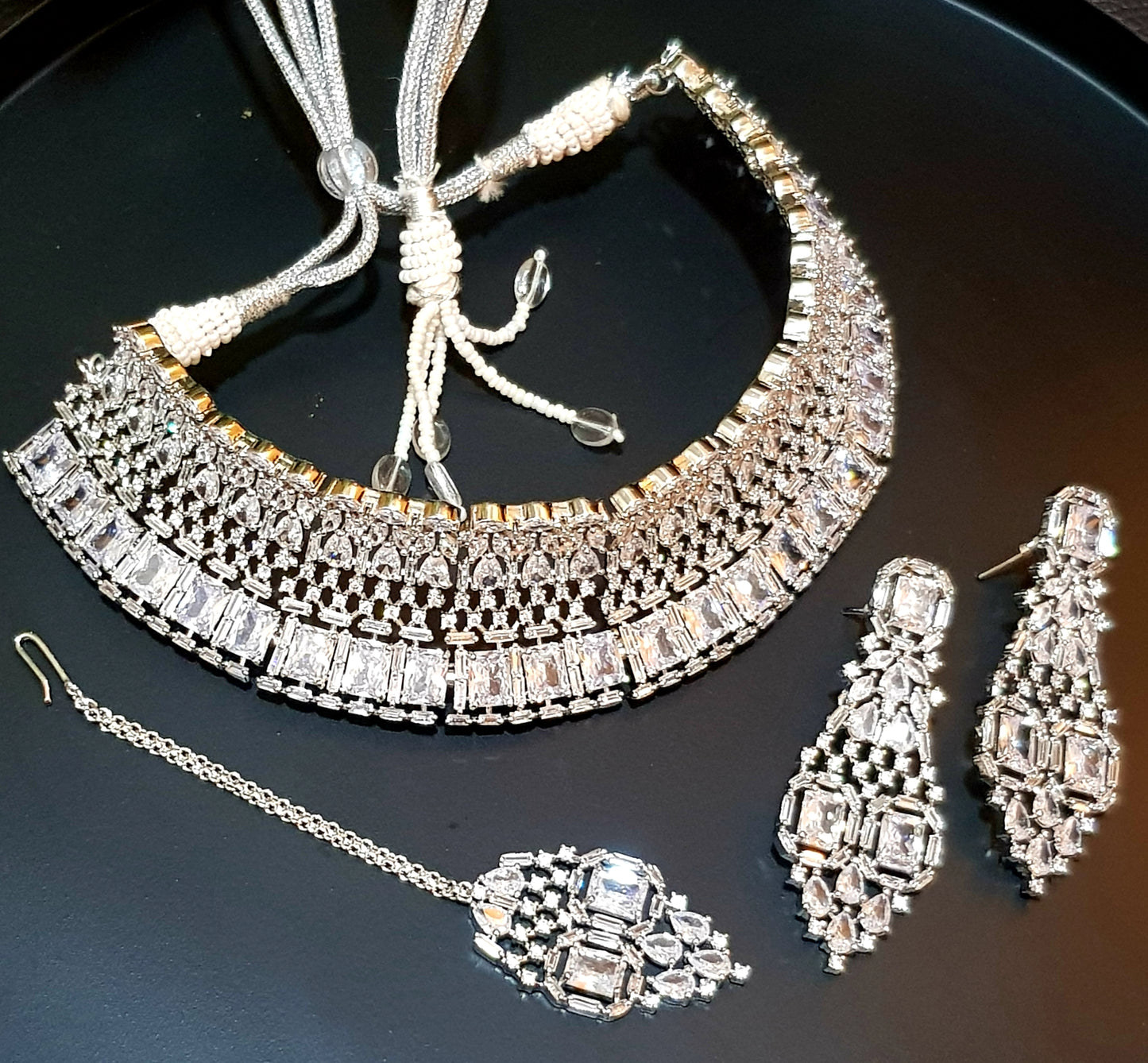 Platinum finish set, broad choker jaali design necklace in small-big CZ, matching earrings and maangteeka