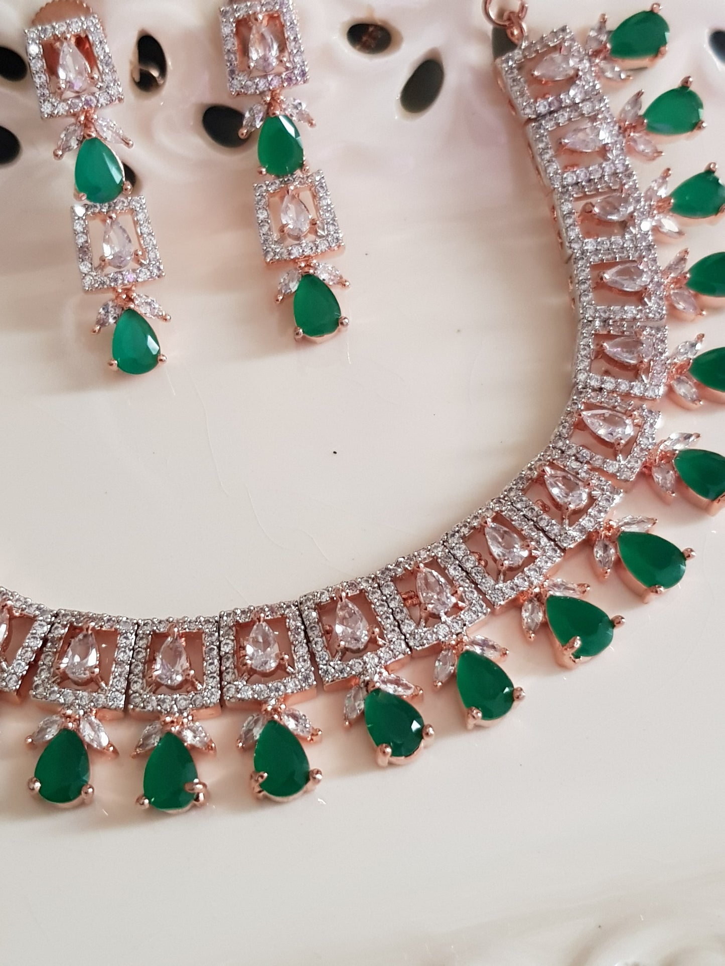 Rose gold finish set, necklace with CZ pieces and emerald drops, matching earrings