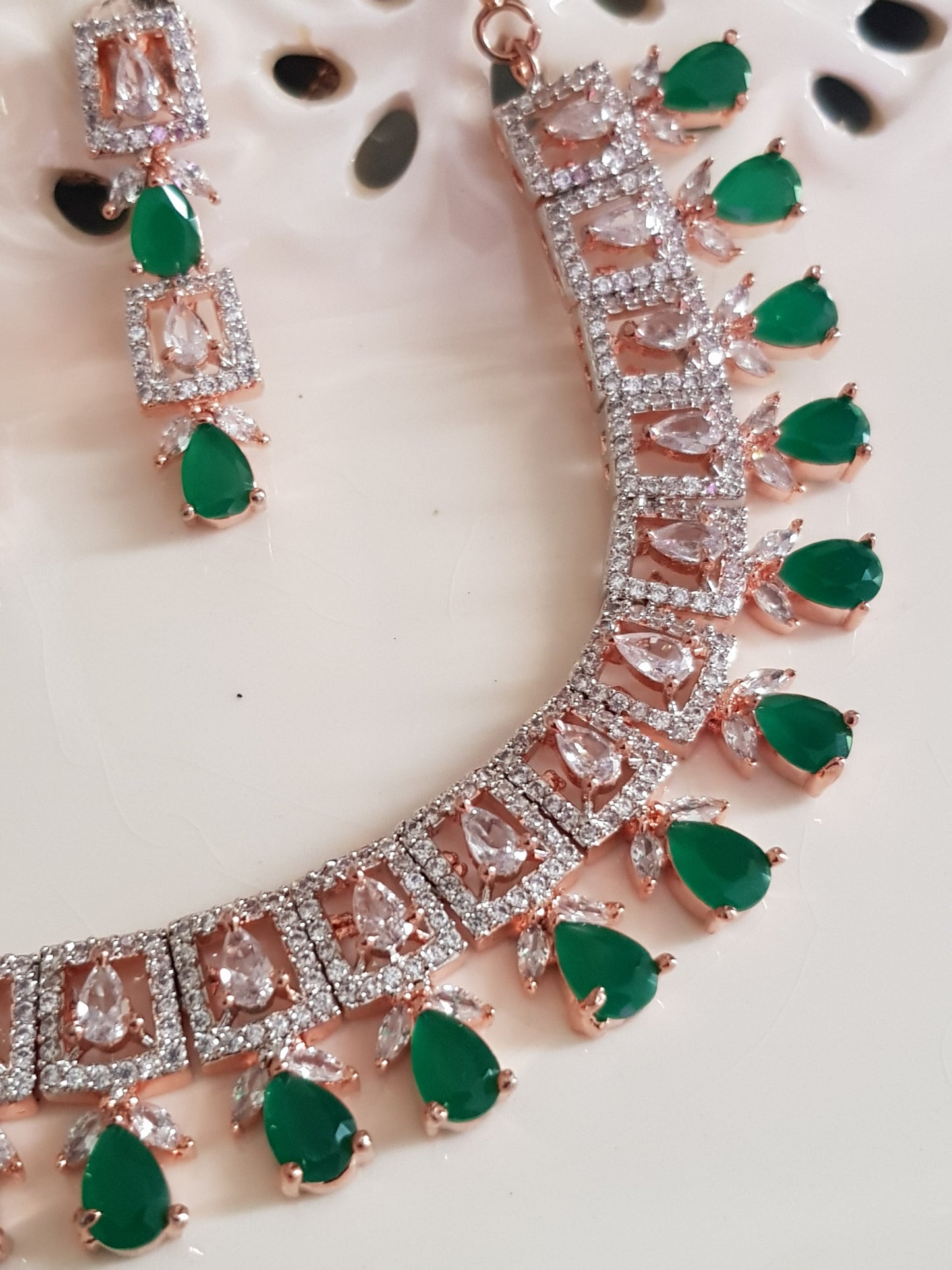 Rose gold finish set, necklace with CZ pieces and emerald drops, matching earrings